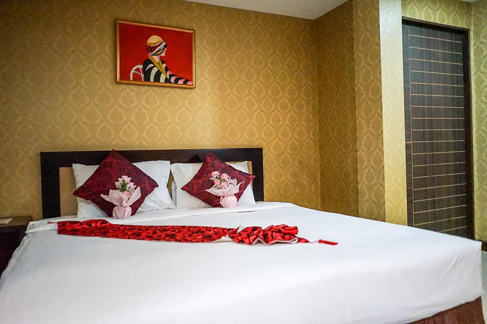 Bed in Grand Lucky Hotel