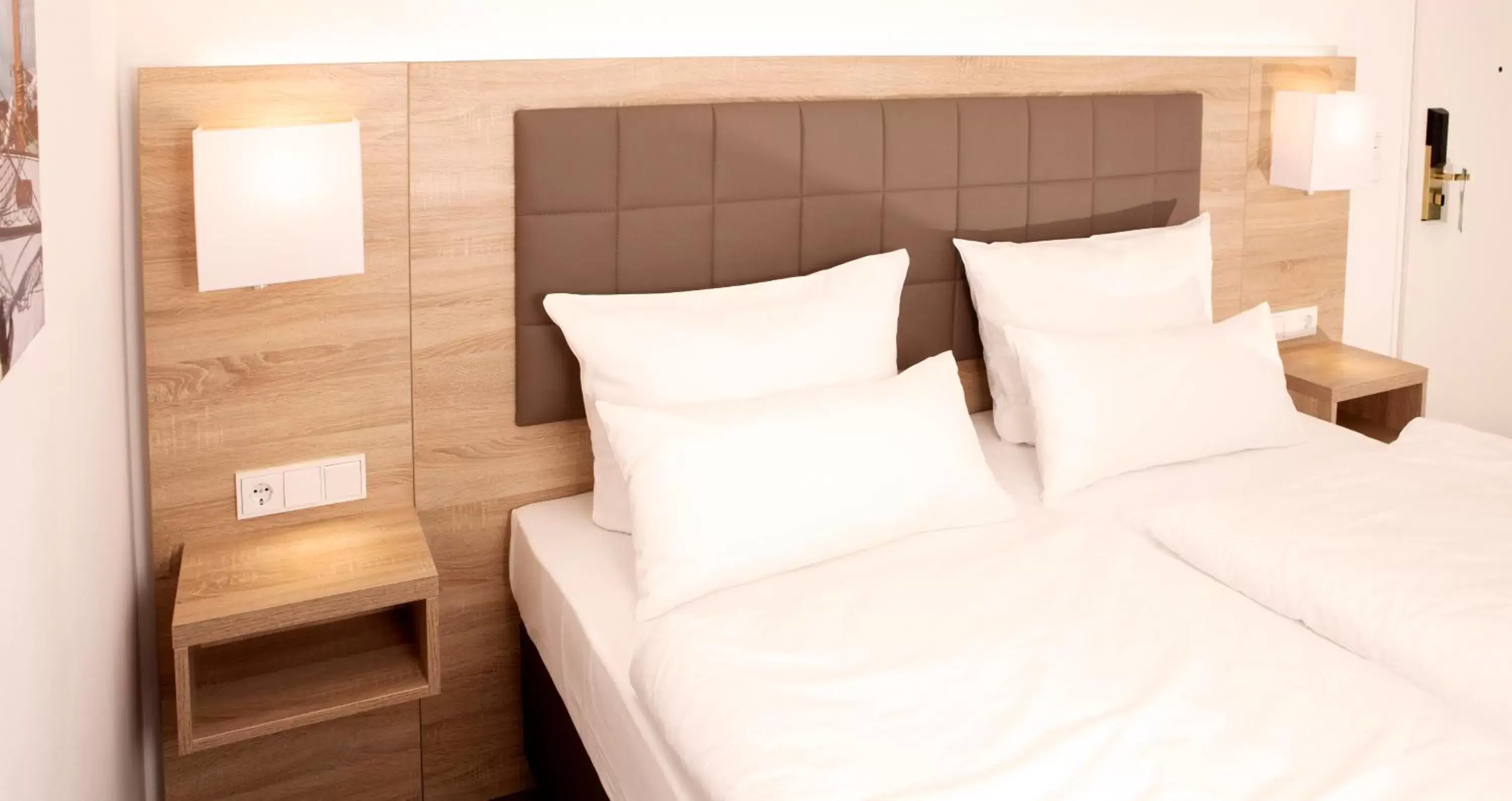 Bed in Hotel Frisia