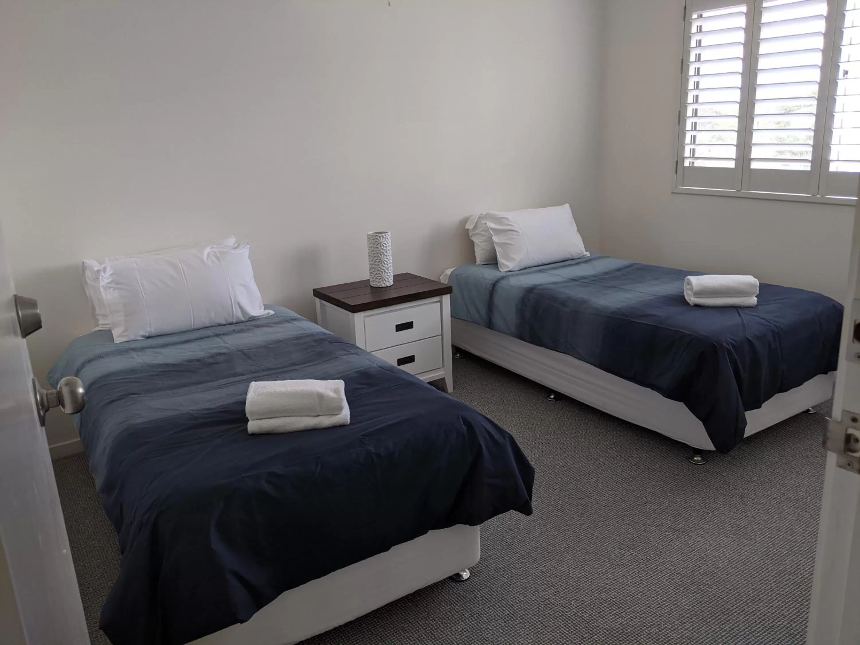 Bed in Moorings Beach Resort