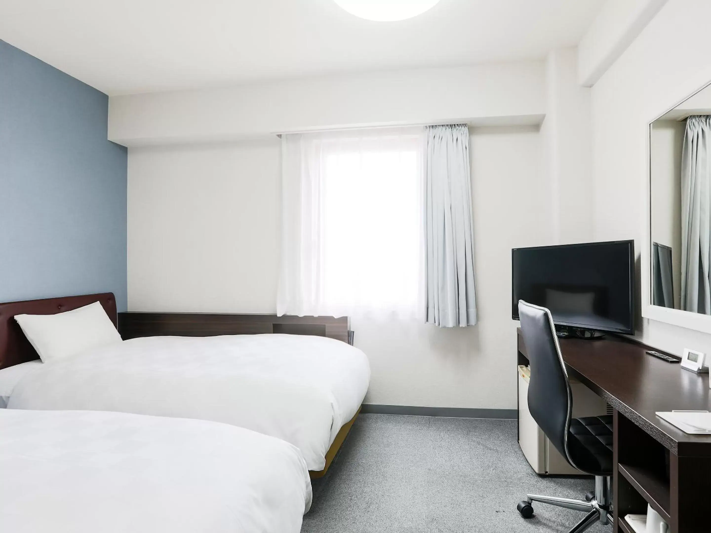 Bed in Hotel Wing International Miyakonojo