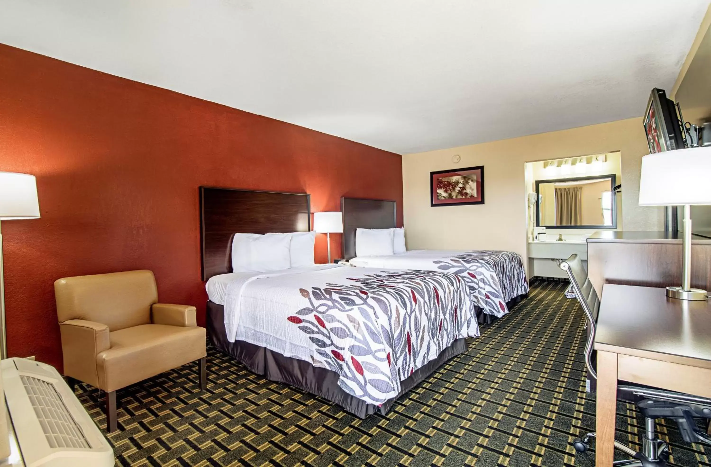 Photo of the whole room, Bed in Red Roof Inn & Suites Greenwood, SC