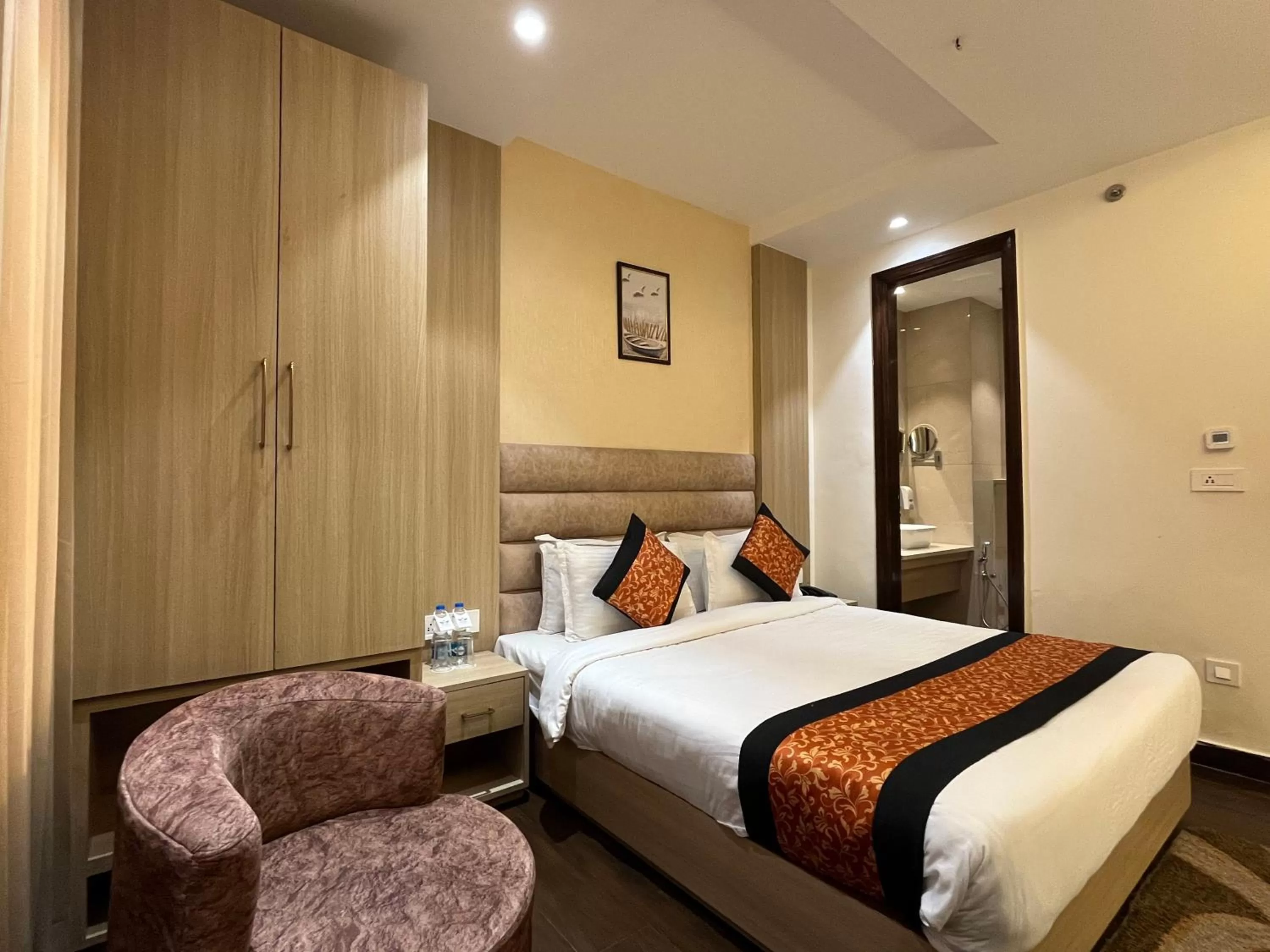 Photo of the whole room, Bed in RRV Hotel