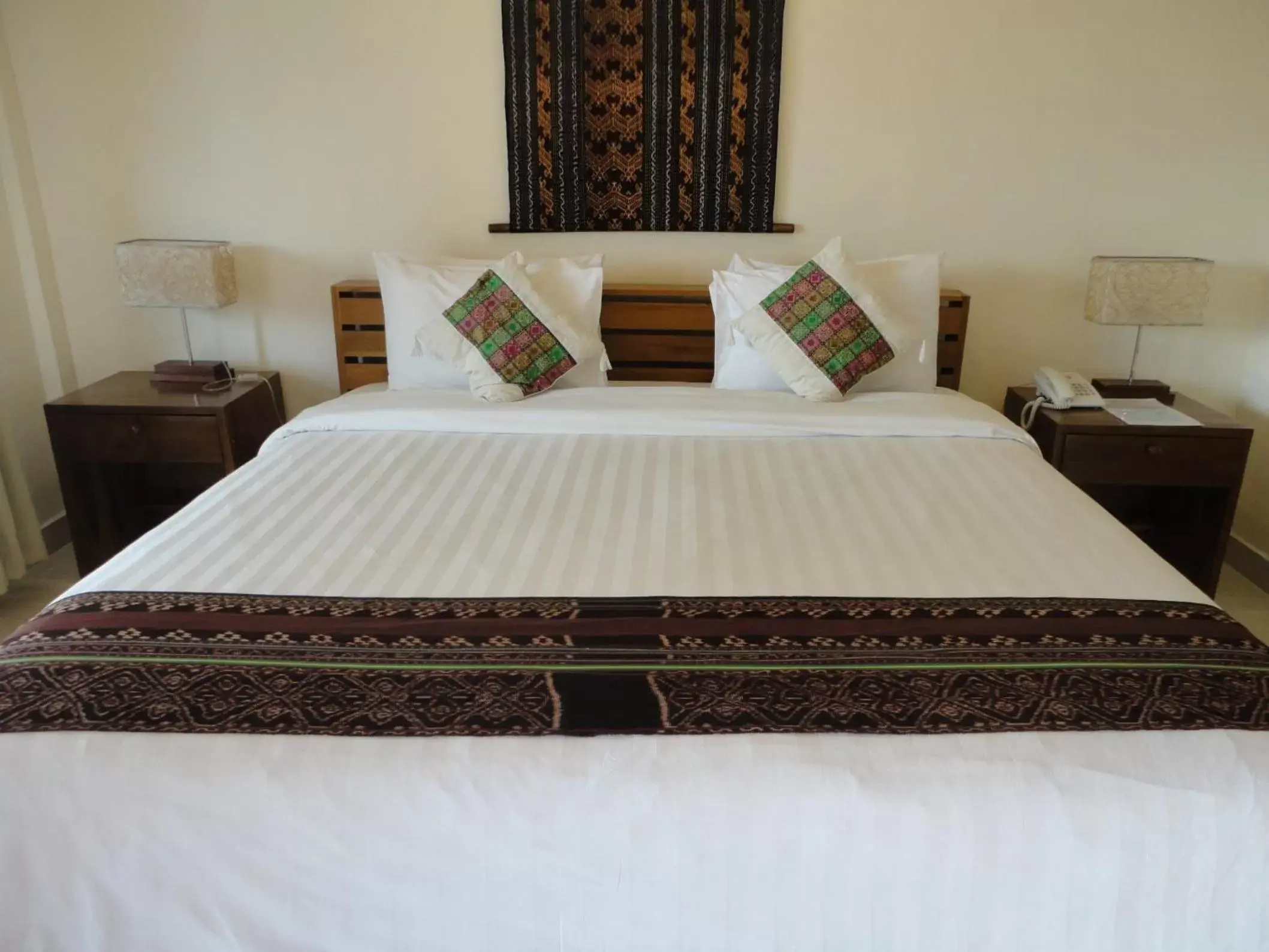 Bed in Puri Sari Beach Hotel