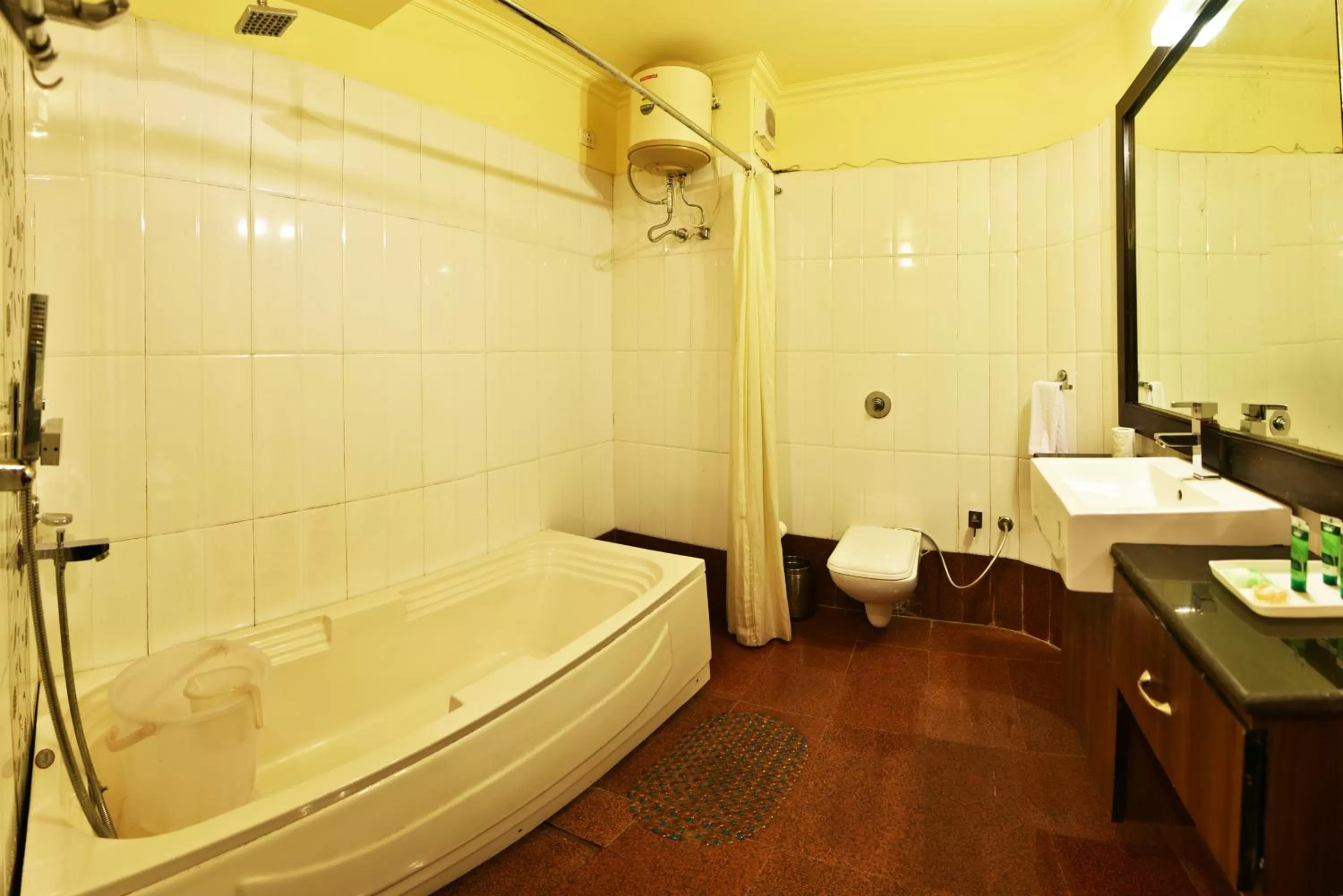 Bathroom in Indraprastha Resort - Centrally Heated Rooms, with Gym, Games & Spa