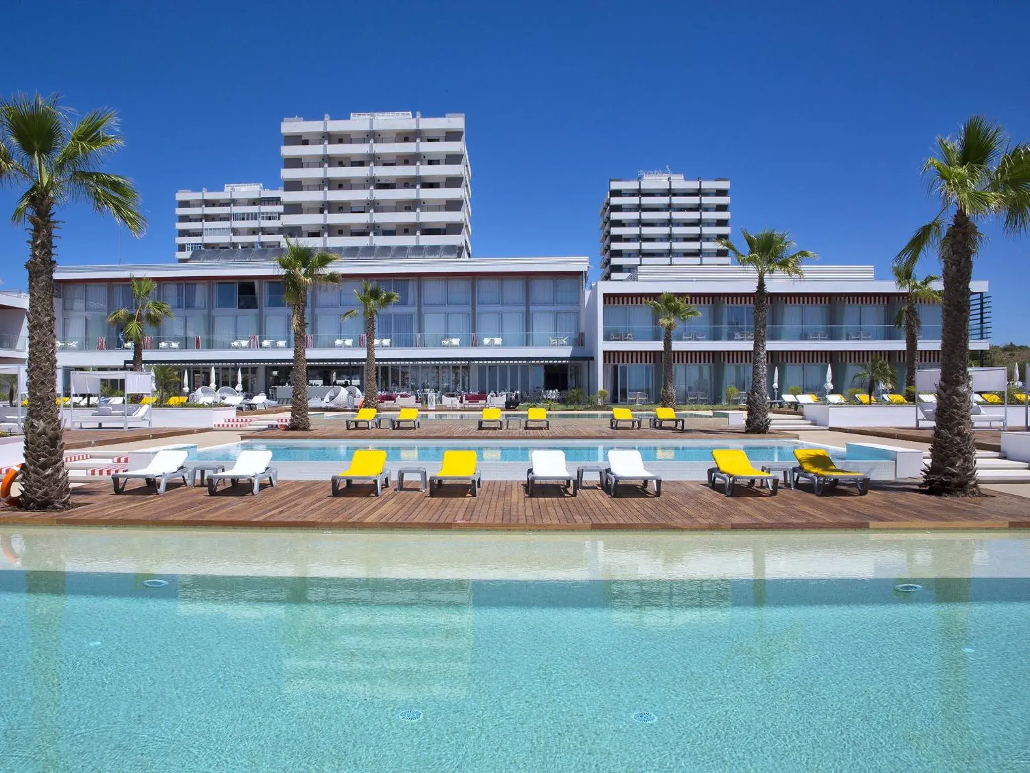 Swimming pool, Property Building in Pestana Alvor South Beach Premium Suite Hotel