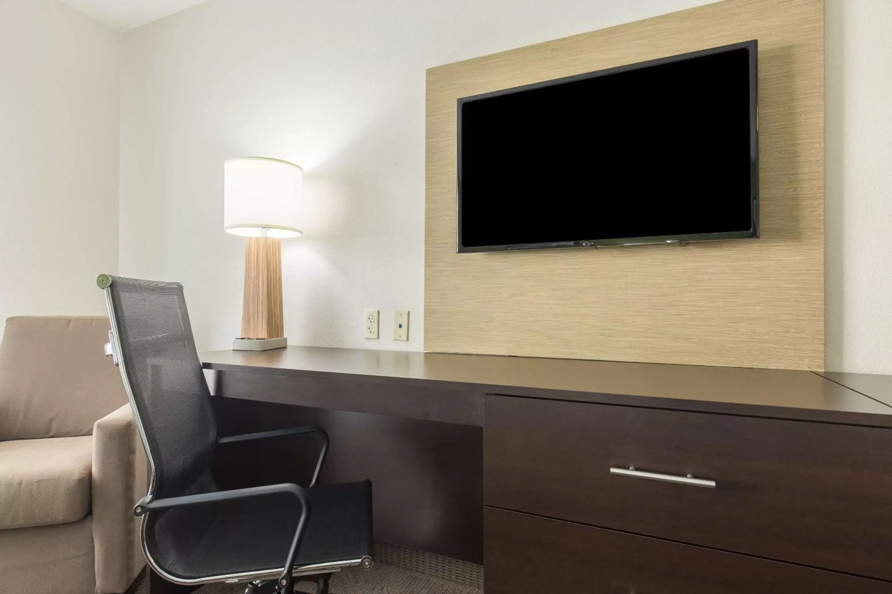 Photo of the whole room, TV/Entertainment Center in Sleep Inn & Suites