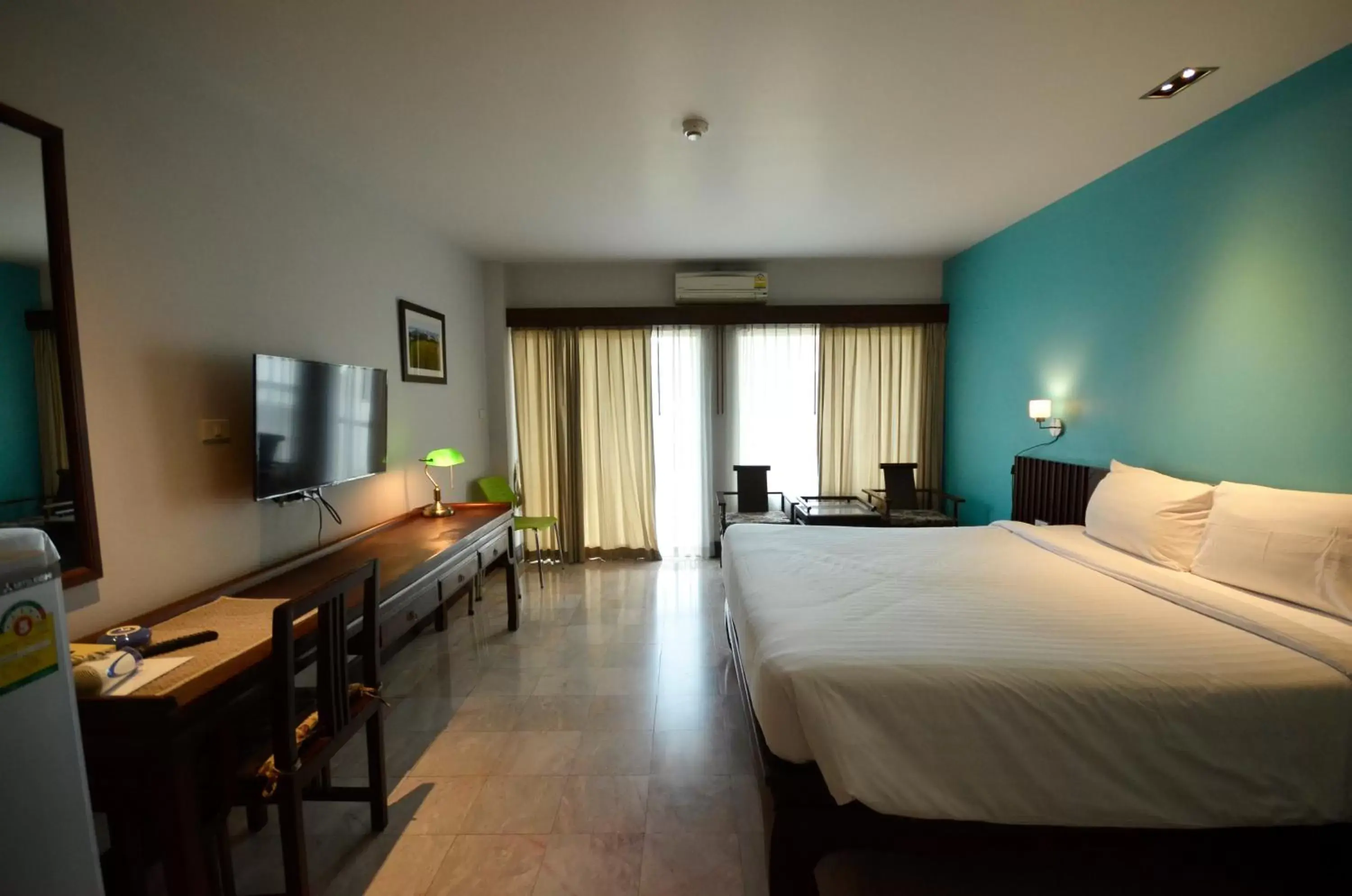 Photo of the whole room, Bed in Sakorn Residence and Hotel Photo of the whole room, Bed in Sakorn Residence and Hotel