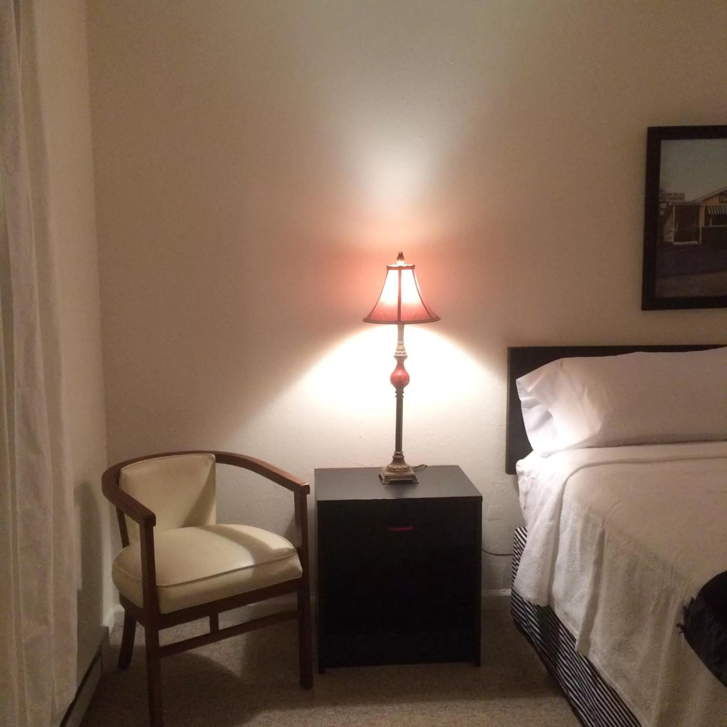 Decorative detail, Bed in Cardinal Inn