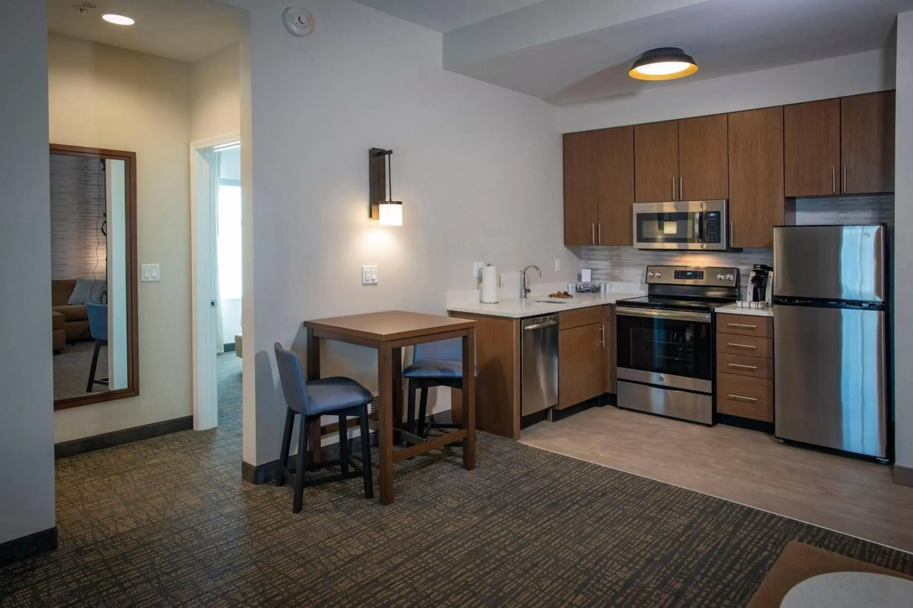 Bedroom, Kitchen/Kitchenette in Residence Inn by Marriott Pensacola Airport/Medical Center