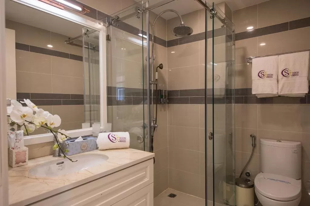 Bathroom in Saigon By Night Luxury Hotel