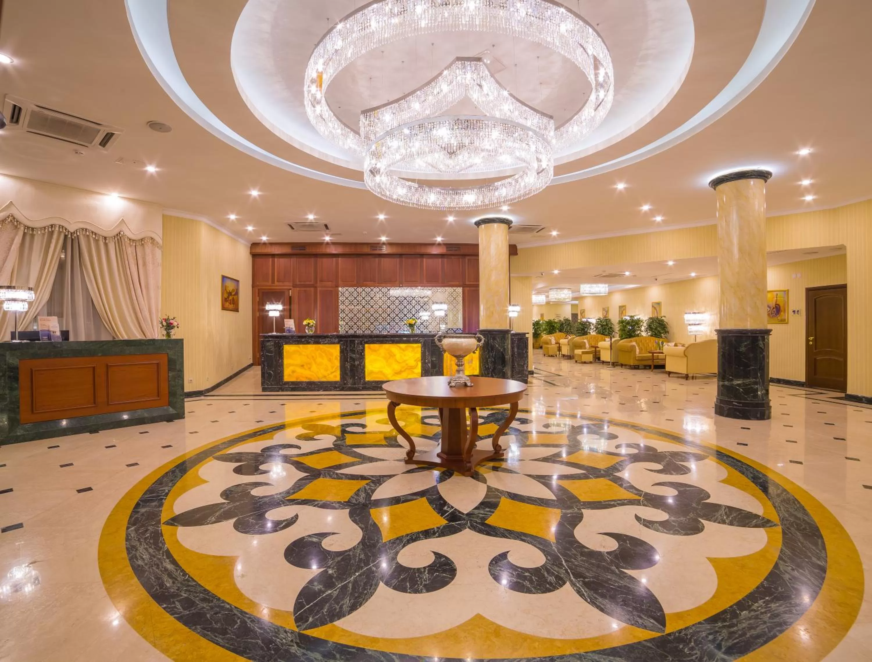 Lobby or reception in Ramada by Wyndham Almaty