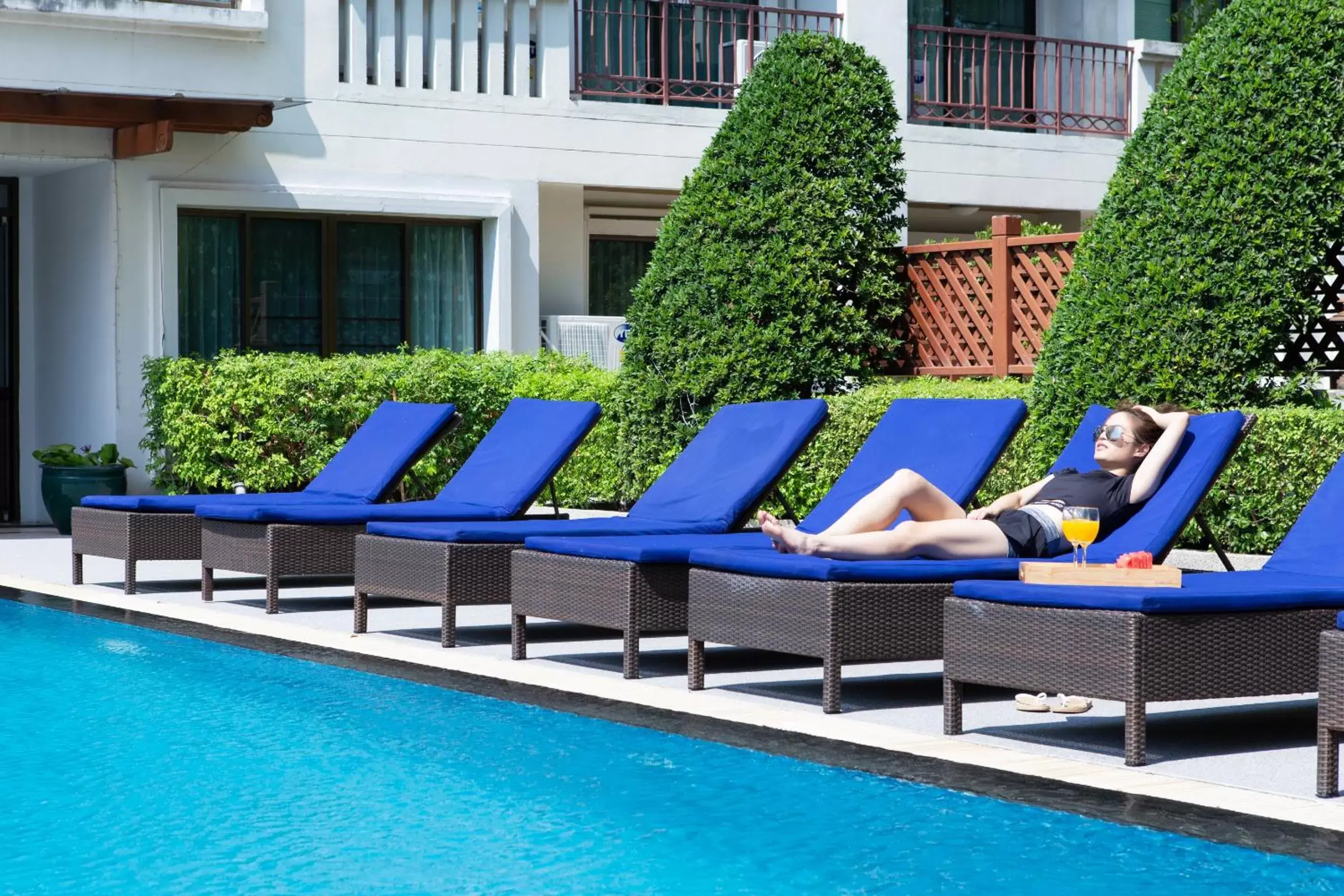 Patio, Swimming Pool in Lasalle Suites Hotel & Residence