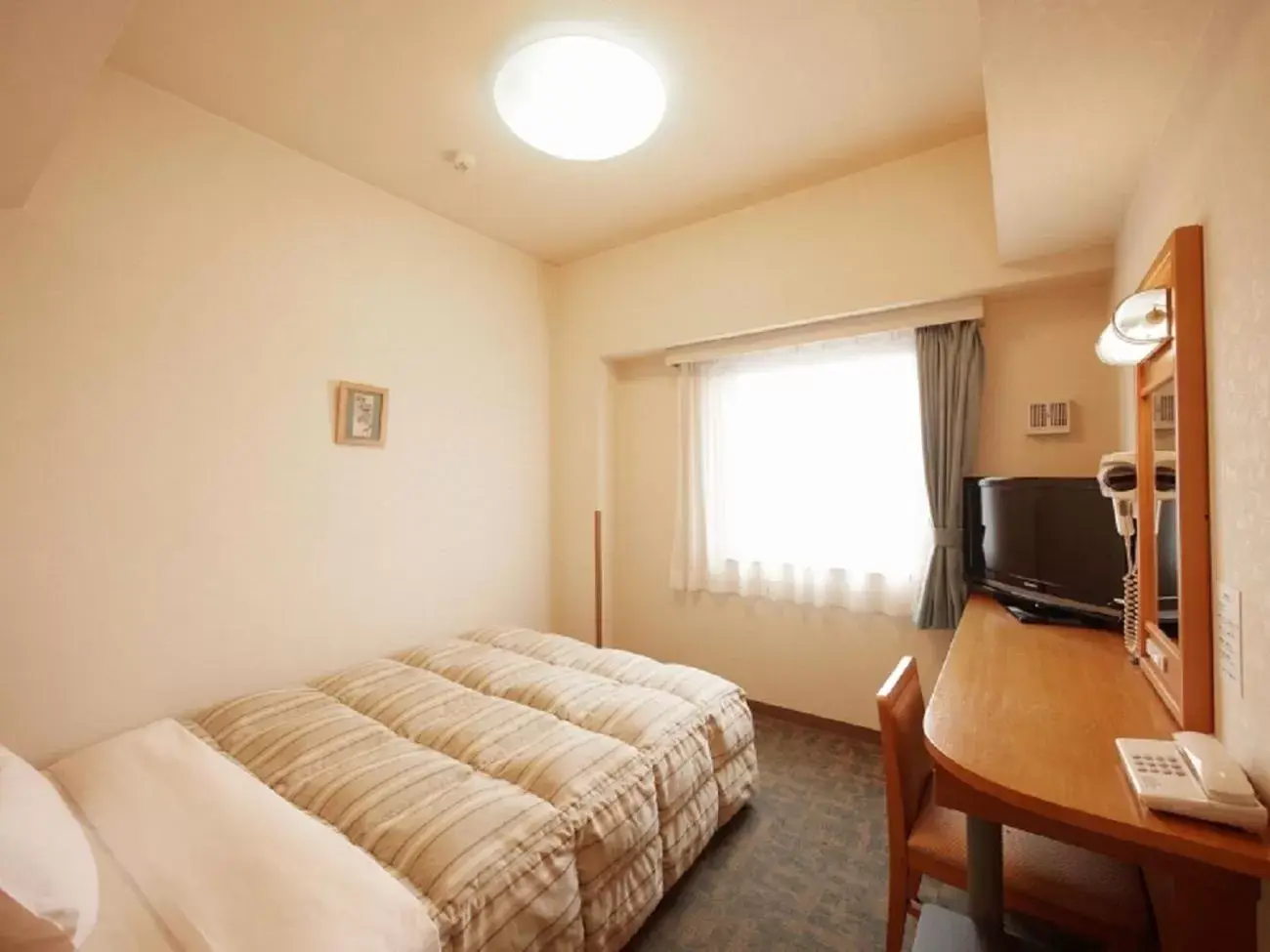 Bed in Hotel Route-Inn Nagaoka Inter