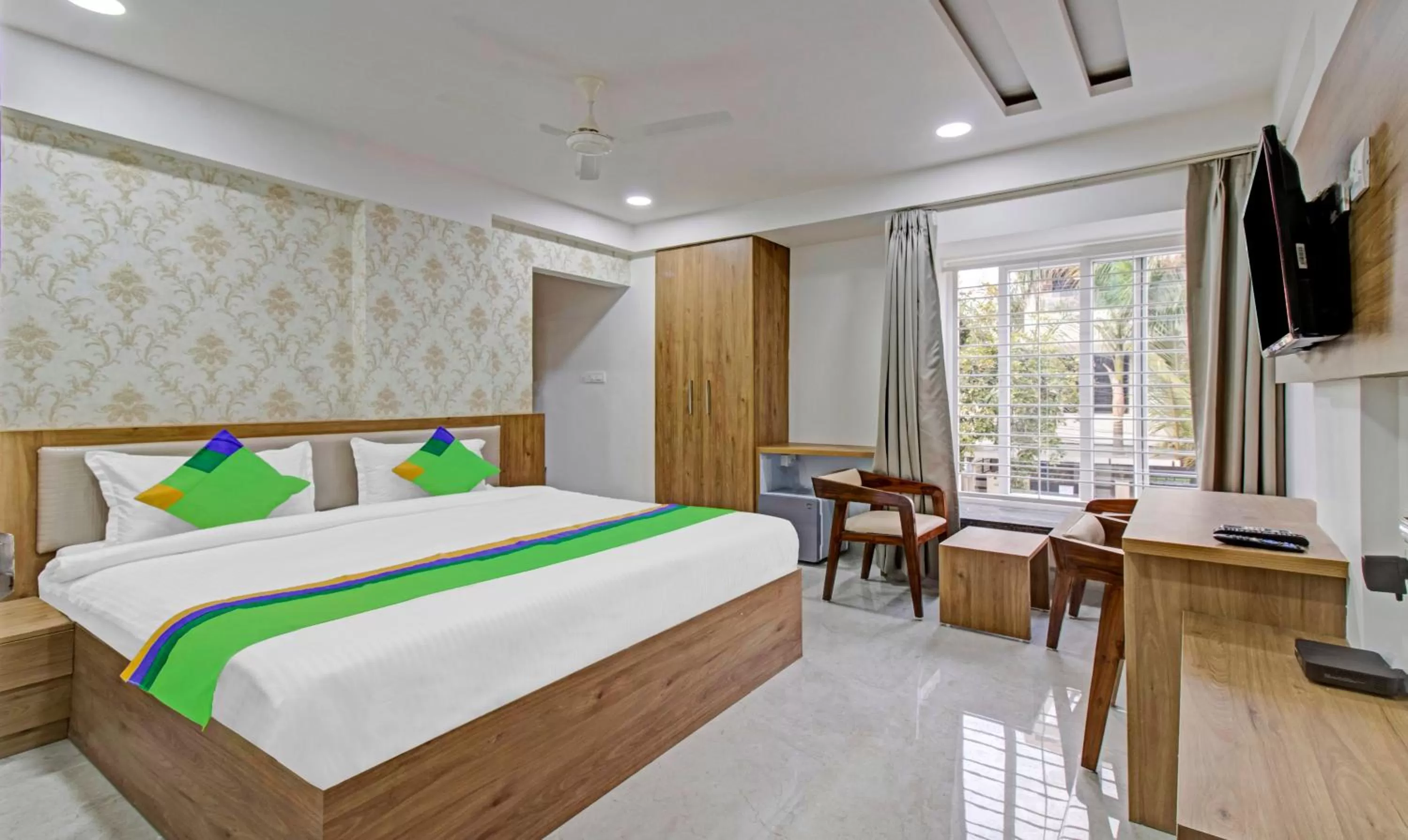 Bedroom, Bed in Treebo Chandraprasth Residency