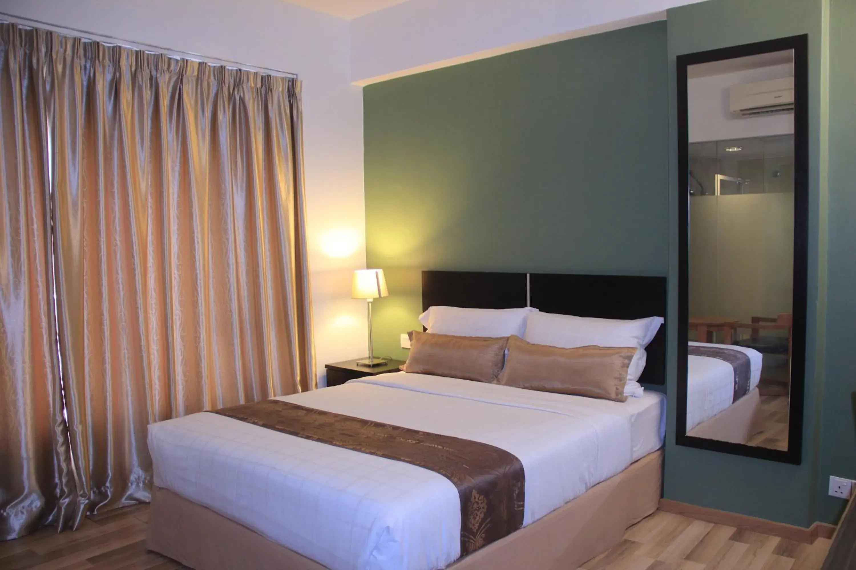 Bed in Alami Garden Hotel