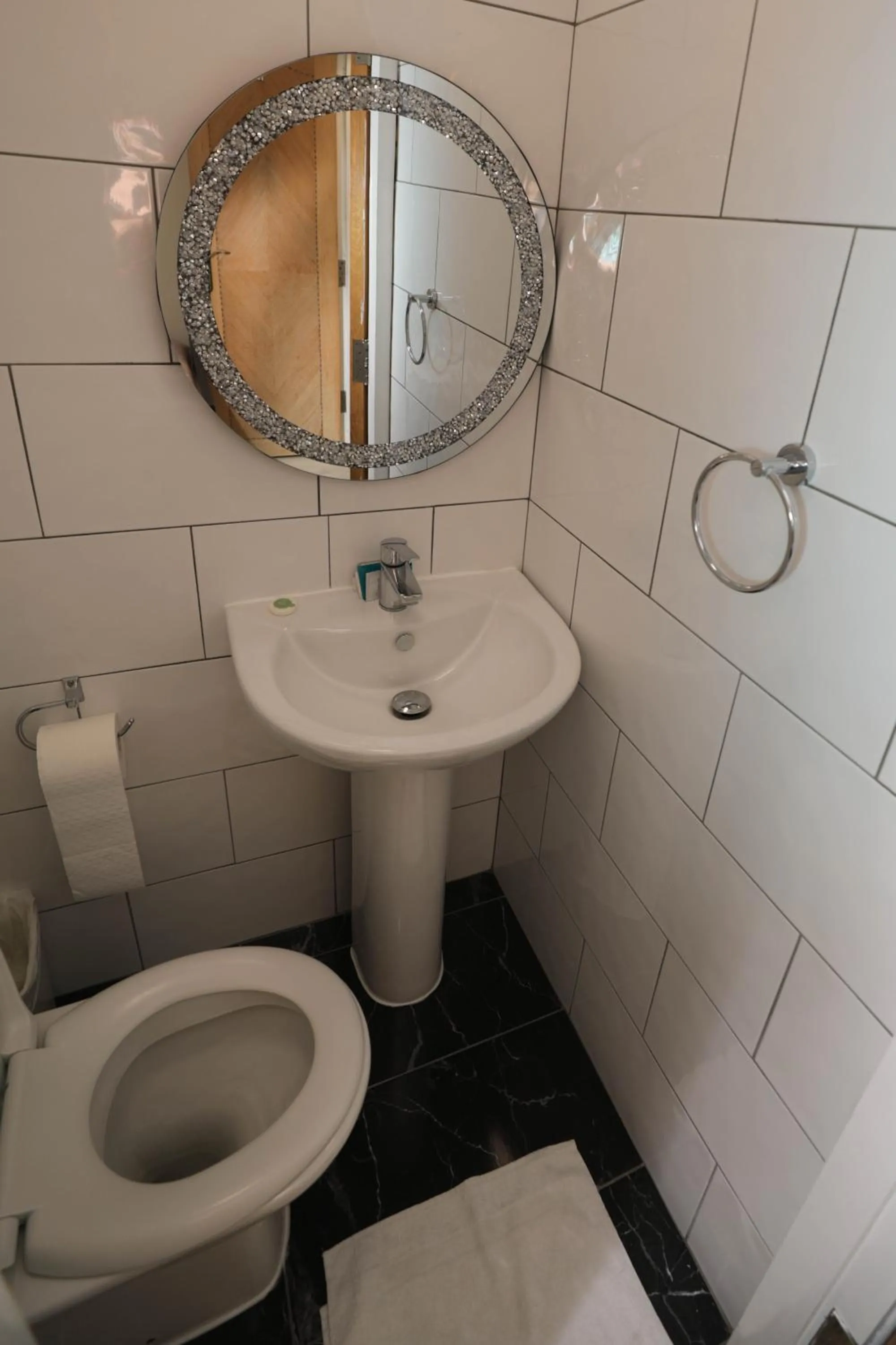 Toilet in Holland Inn Hotel