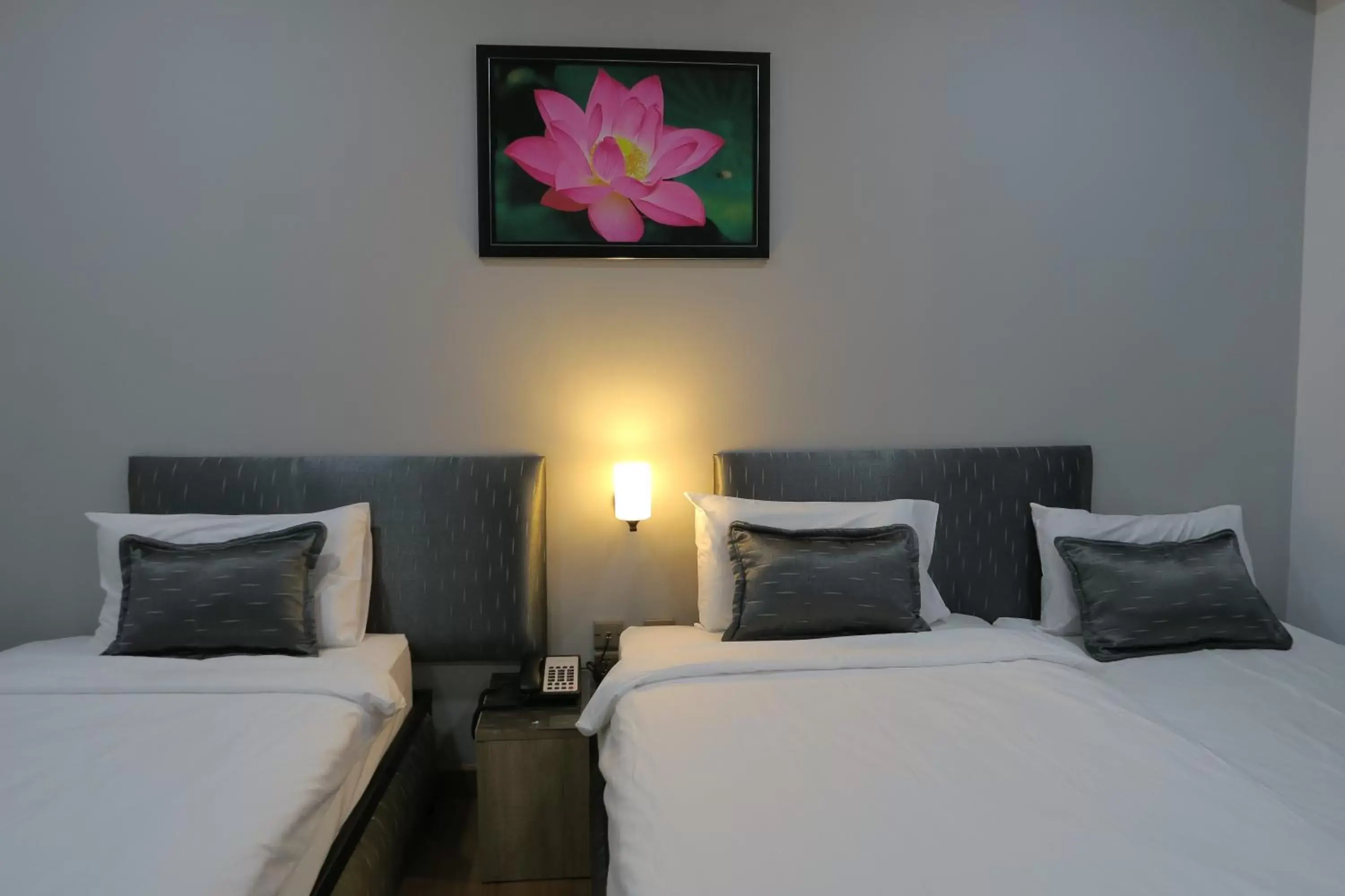 Classic Triple Room in The Mira Hotel Chiang Rai Classic Triple Room in The Mira Hotel Chiang Rai