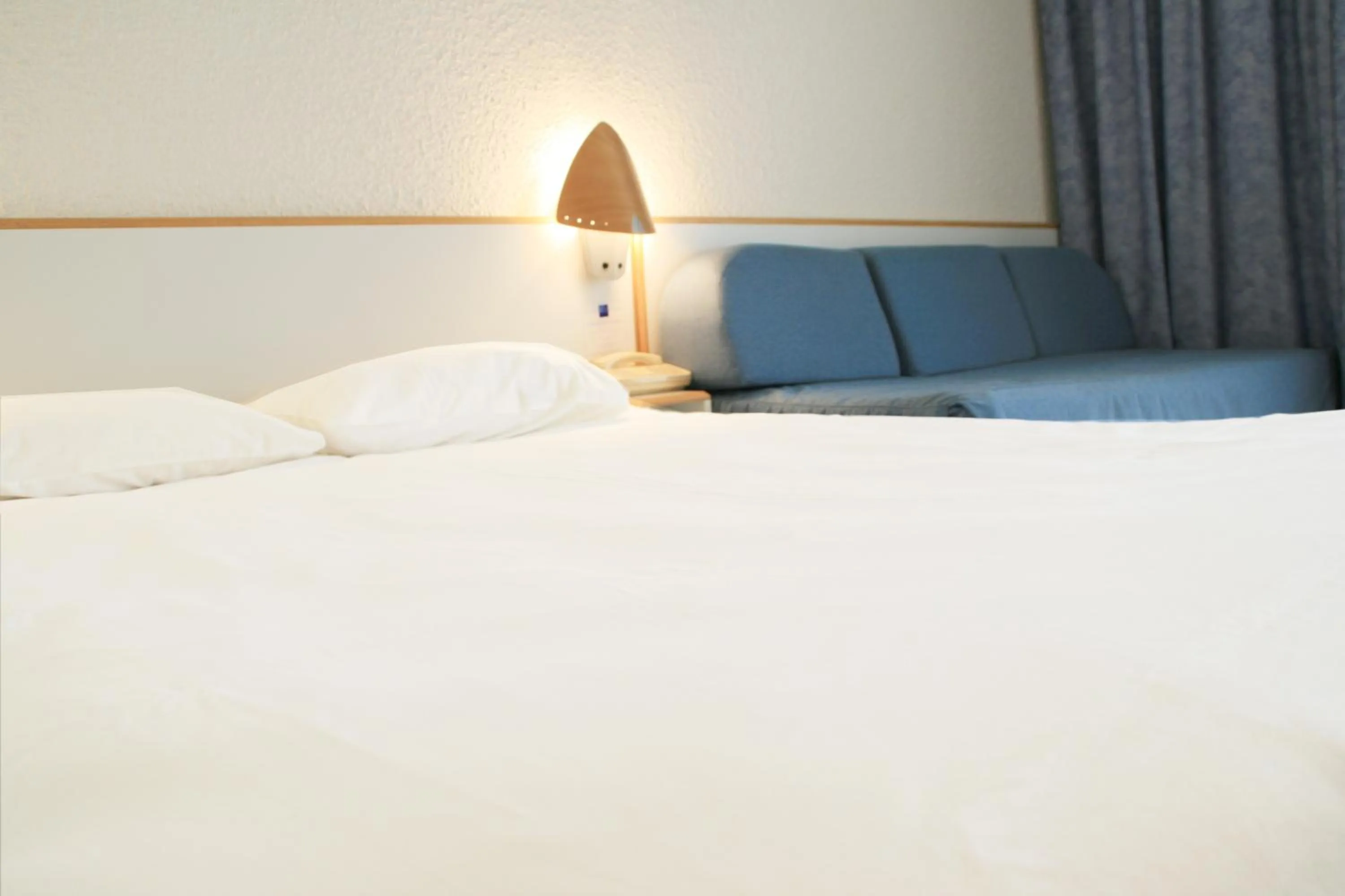 Bedroom in Hôtel des Thermes Les Dômes