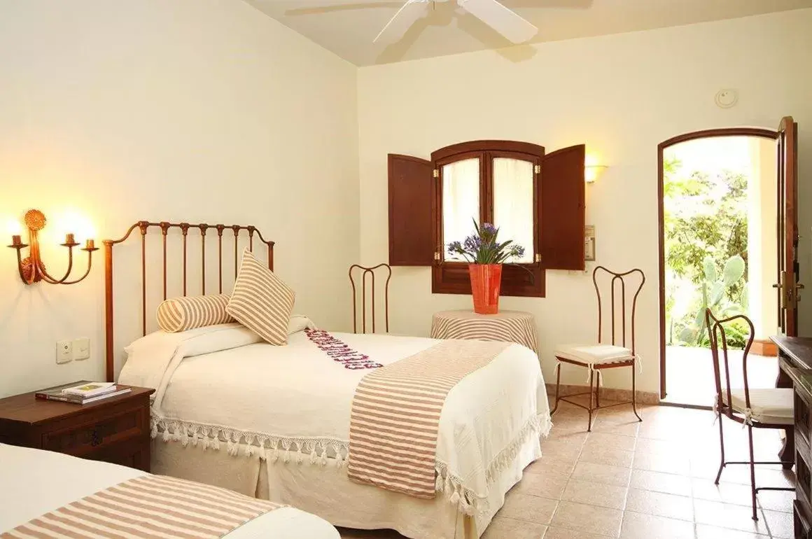 Bed in Hotel Hacienda Los Laureles