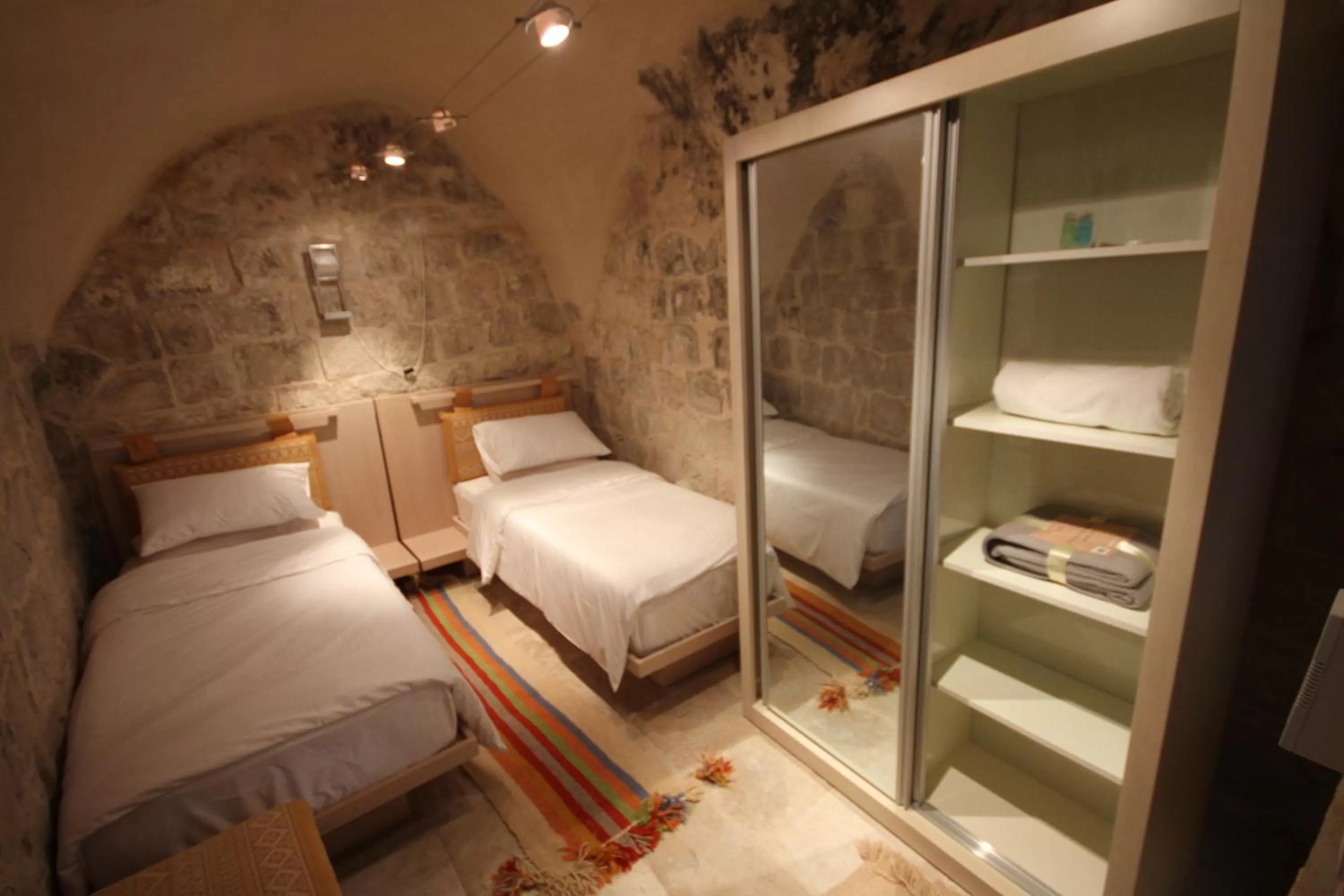 Decorative detail, Bed in Khan Alwakala Hotel