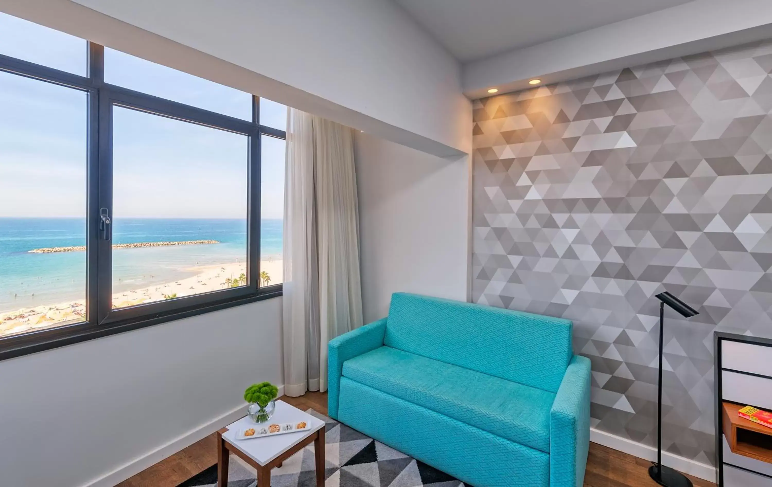 Bedroom, Seating Area in Prima Tel Aviv Hotel