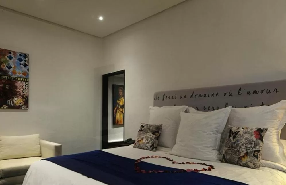 Bed in Le Sphinx Boutique Hôtel