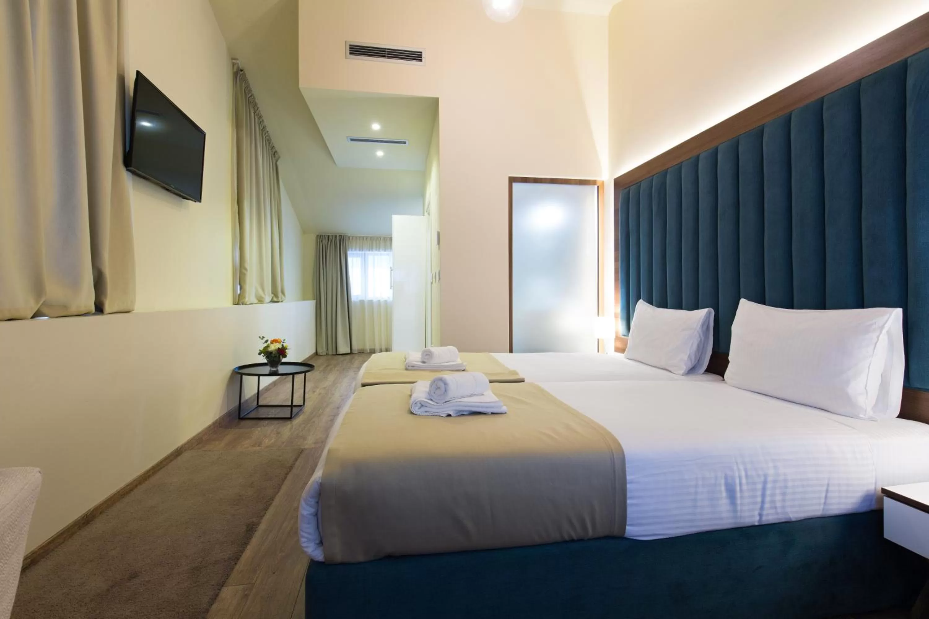 Bed in Marquise Hotel Garni