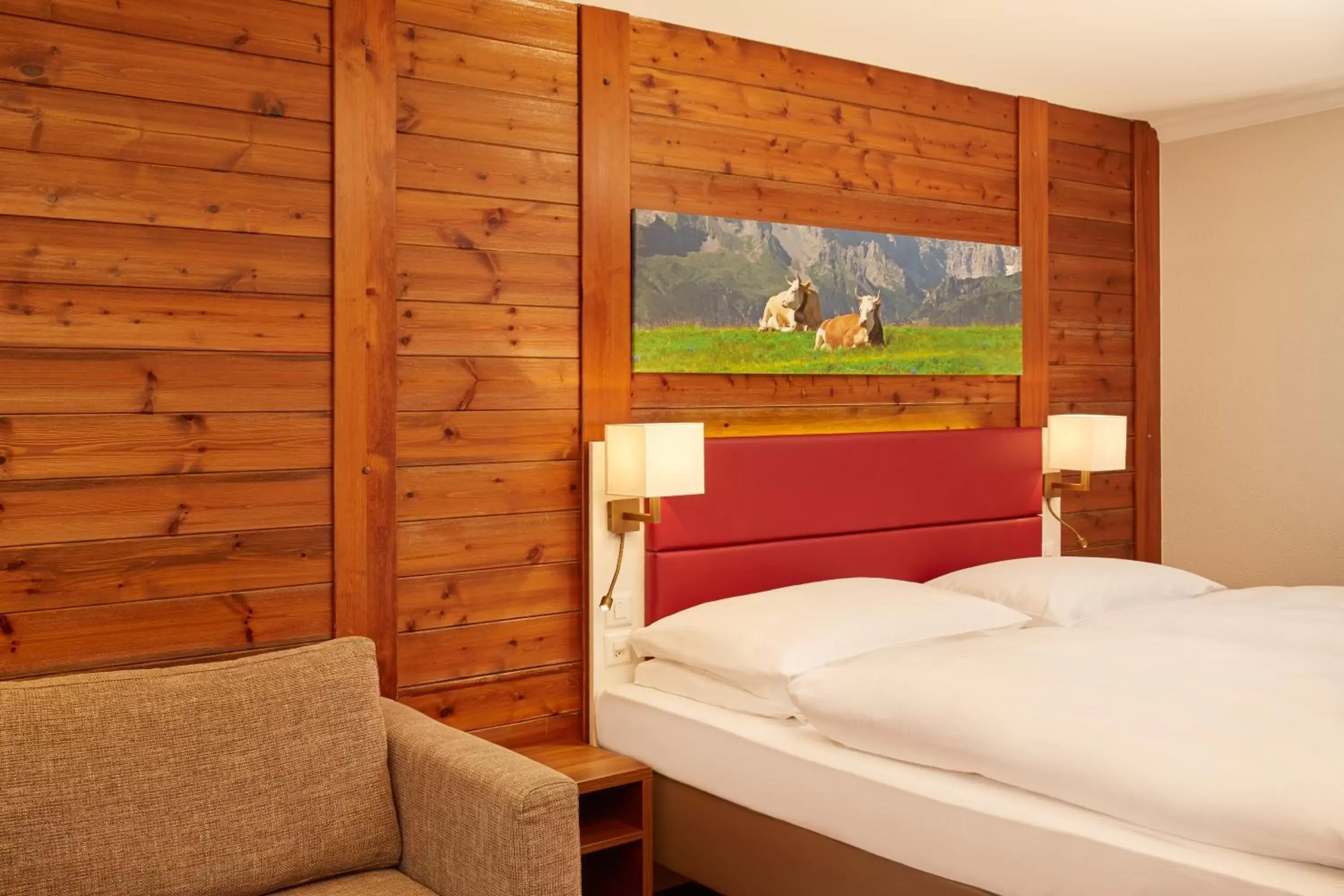 Photo of the whole room, Bed in H+ Hotel & SPA Engelberg