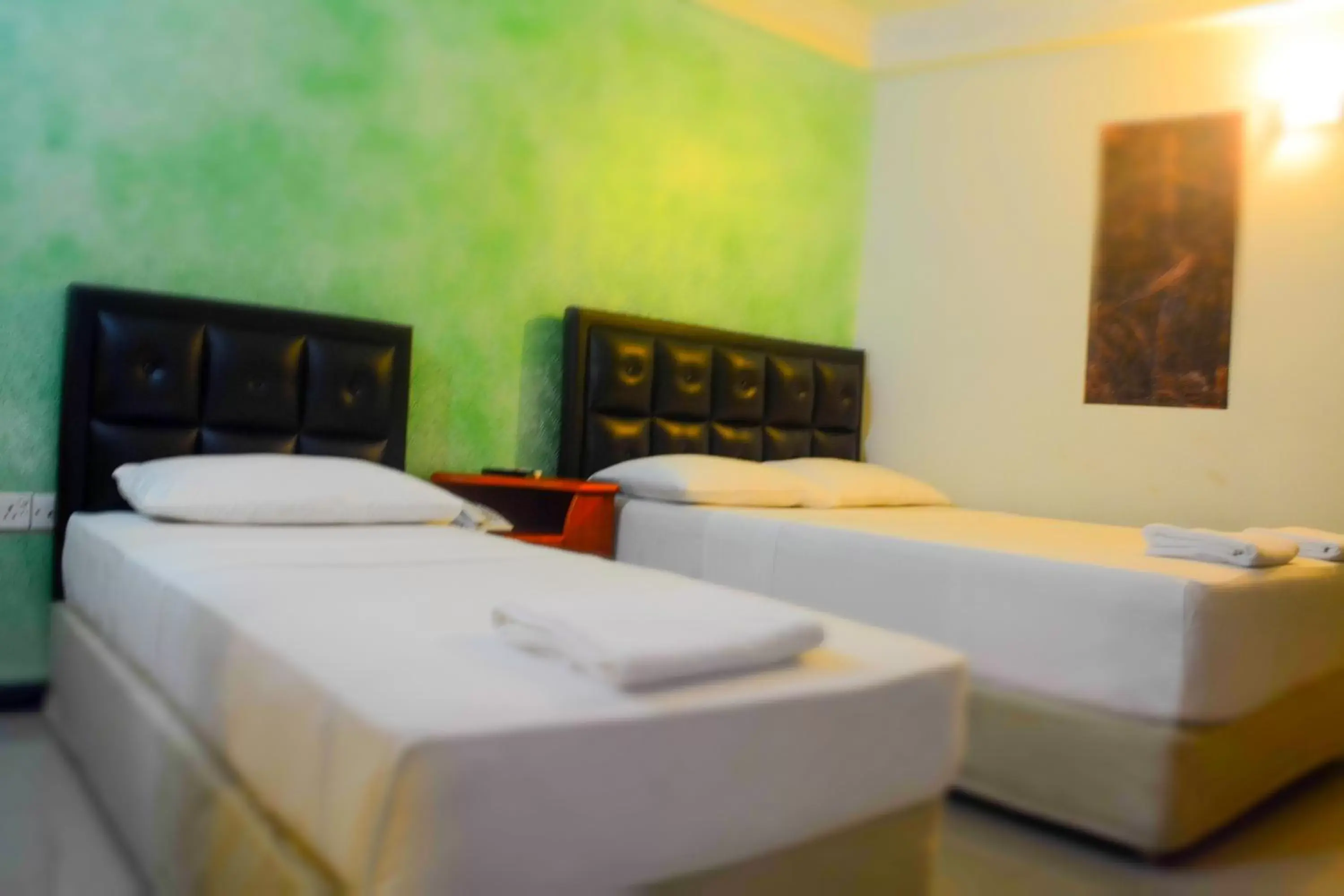 Bedroom, Bed in Saasha City Hotel