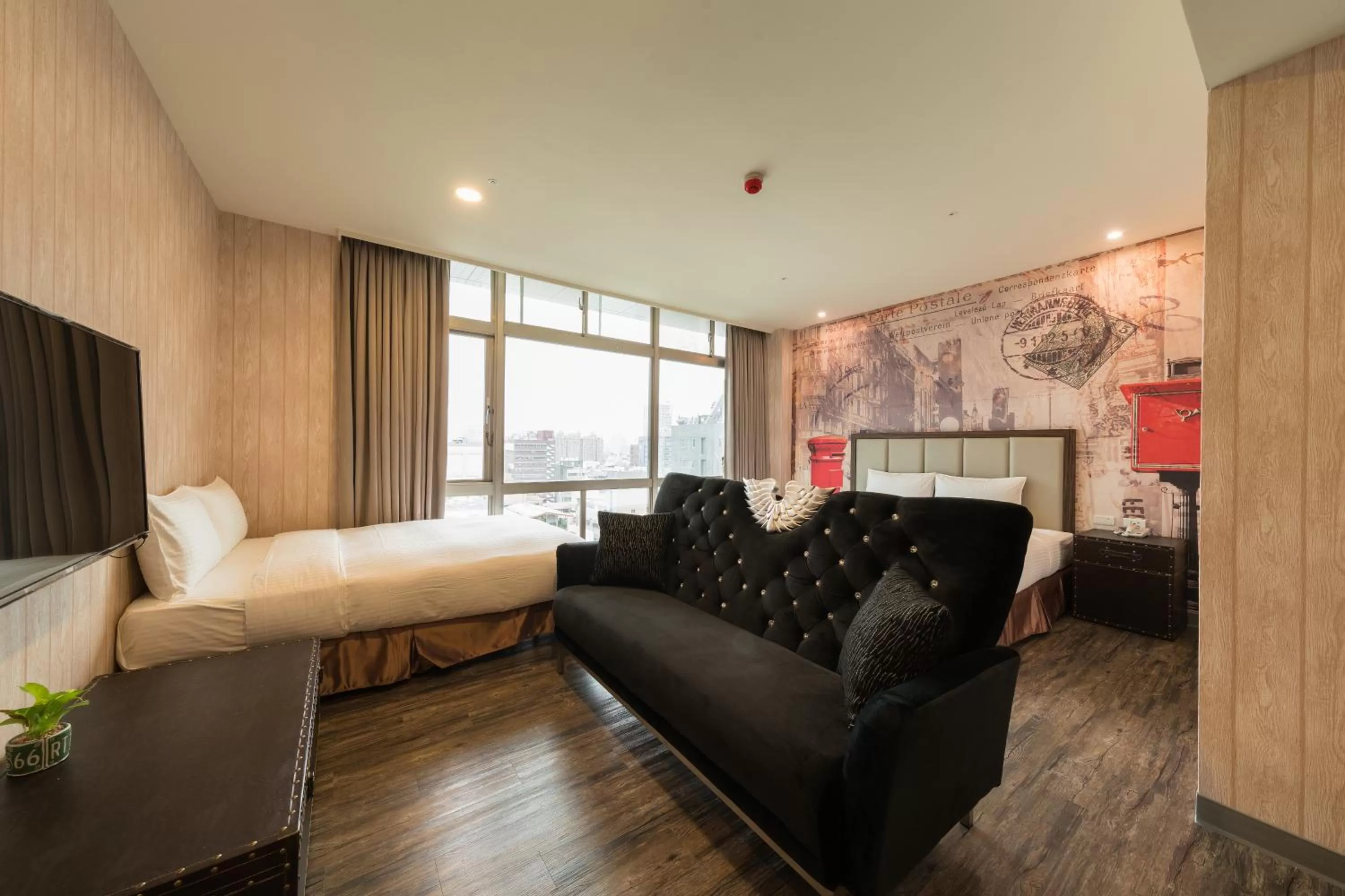 Seating area, Bed in Skyone Hotel