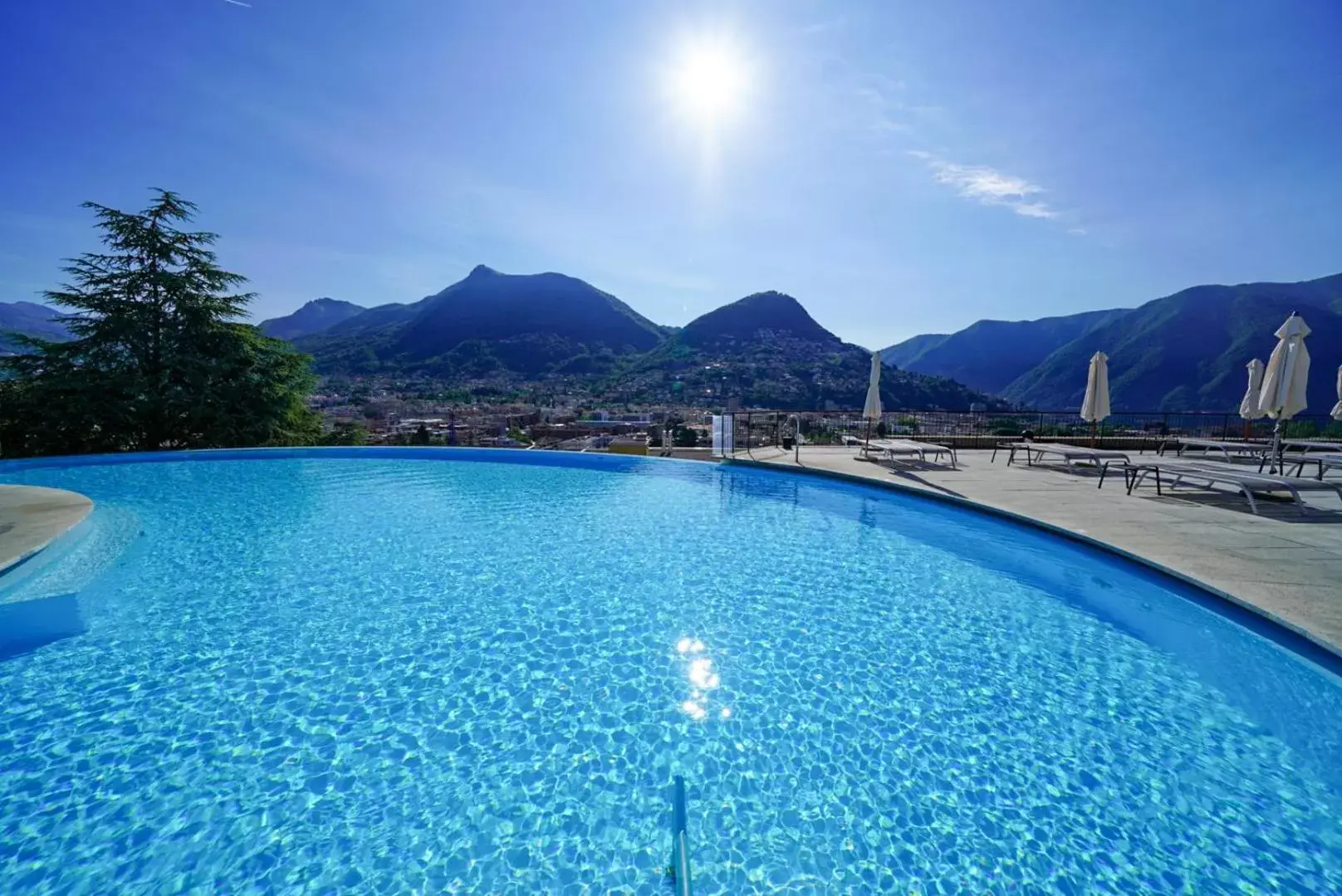 Pool view, Swimming Pool in Villa Sassa Hotel, Residence & Spa - Ticino Hotels Group