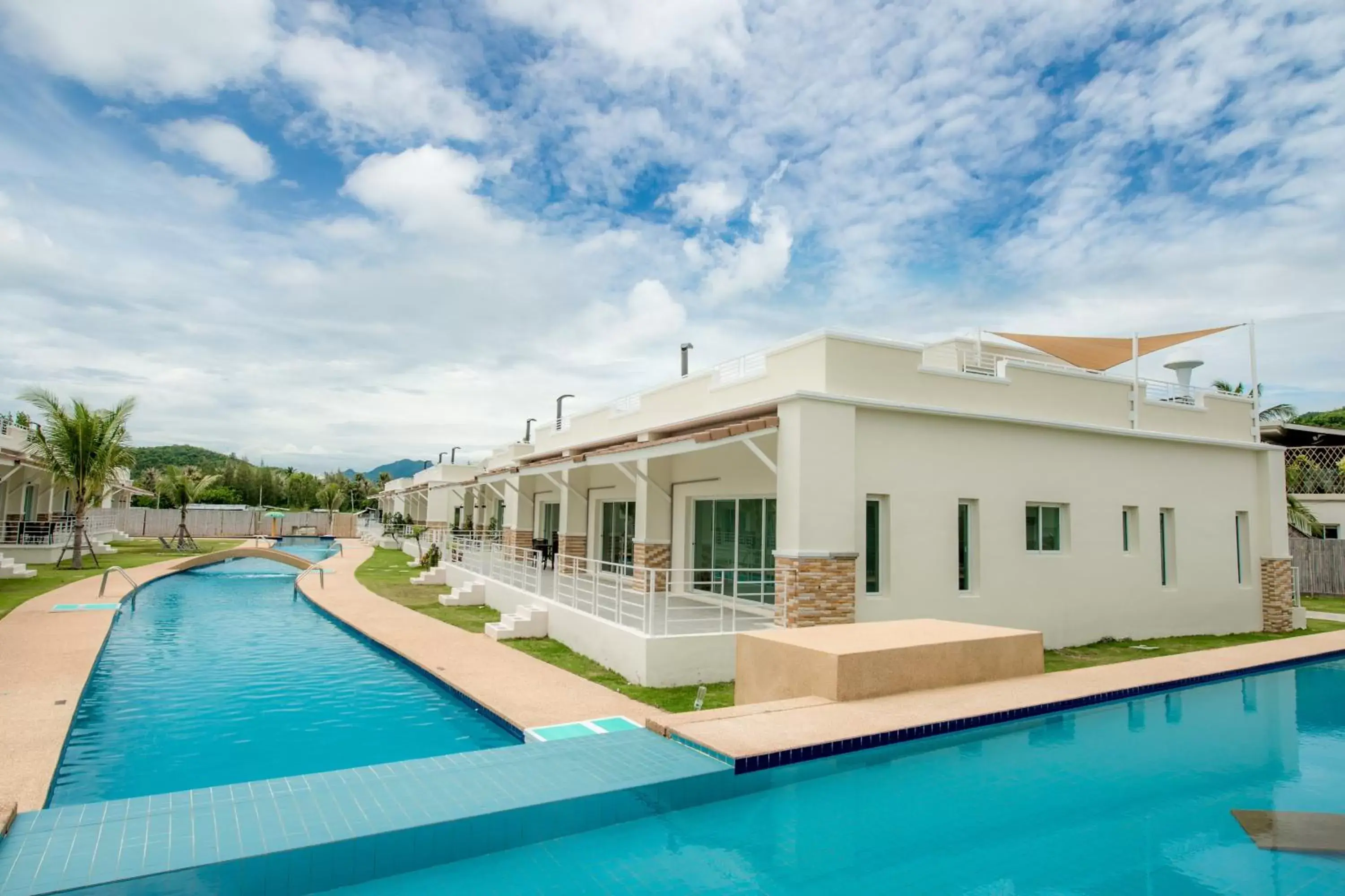 Swimming pool, Property Building in Oriental Beach Pearl Resort