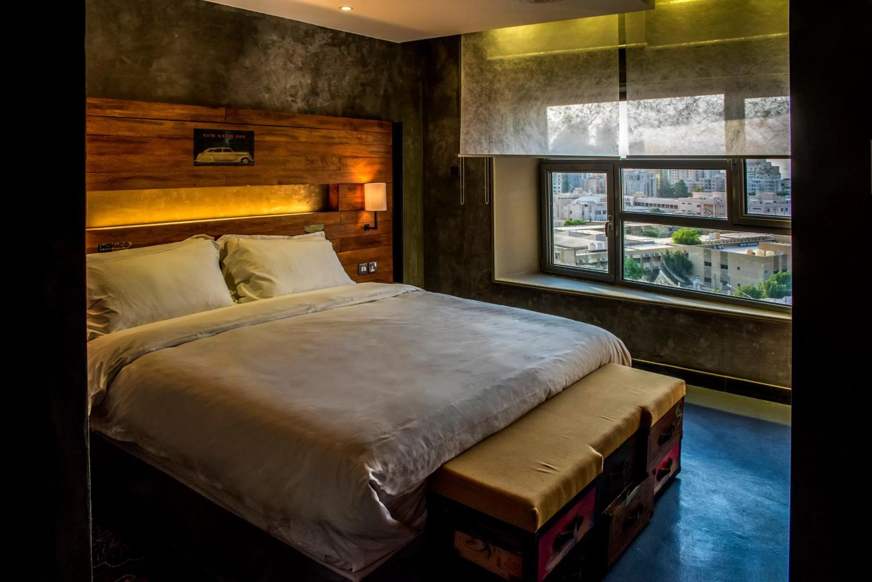 Bed in Flowery Holiday Suites