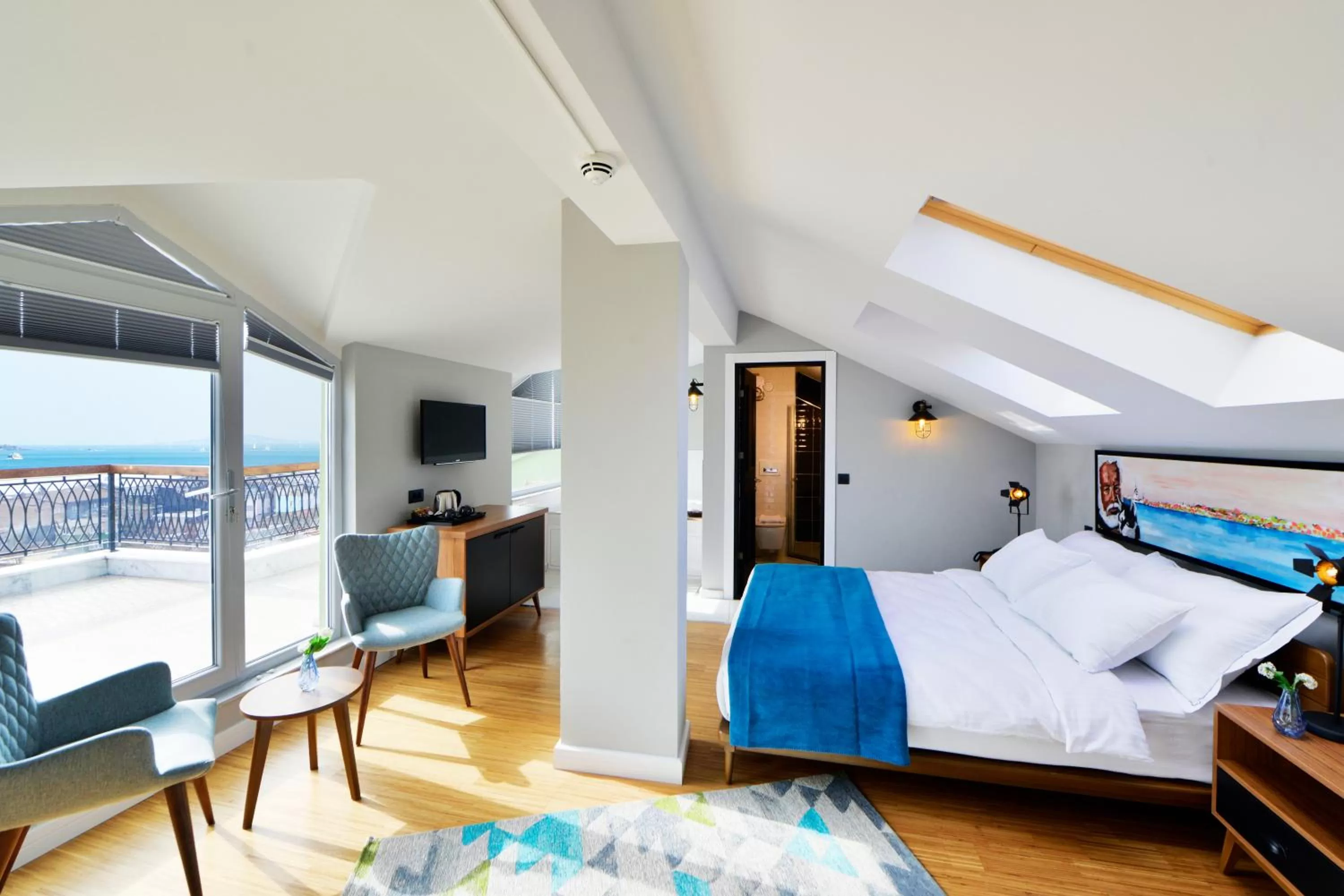 Photo of the whole room, Bed in Hotel Poem