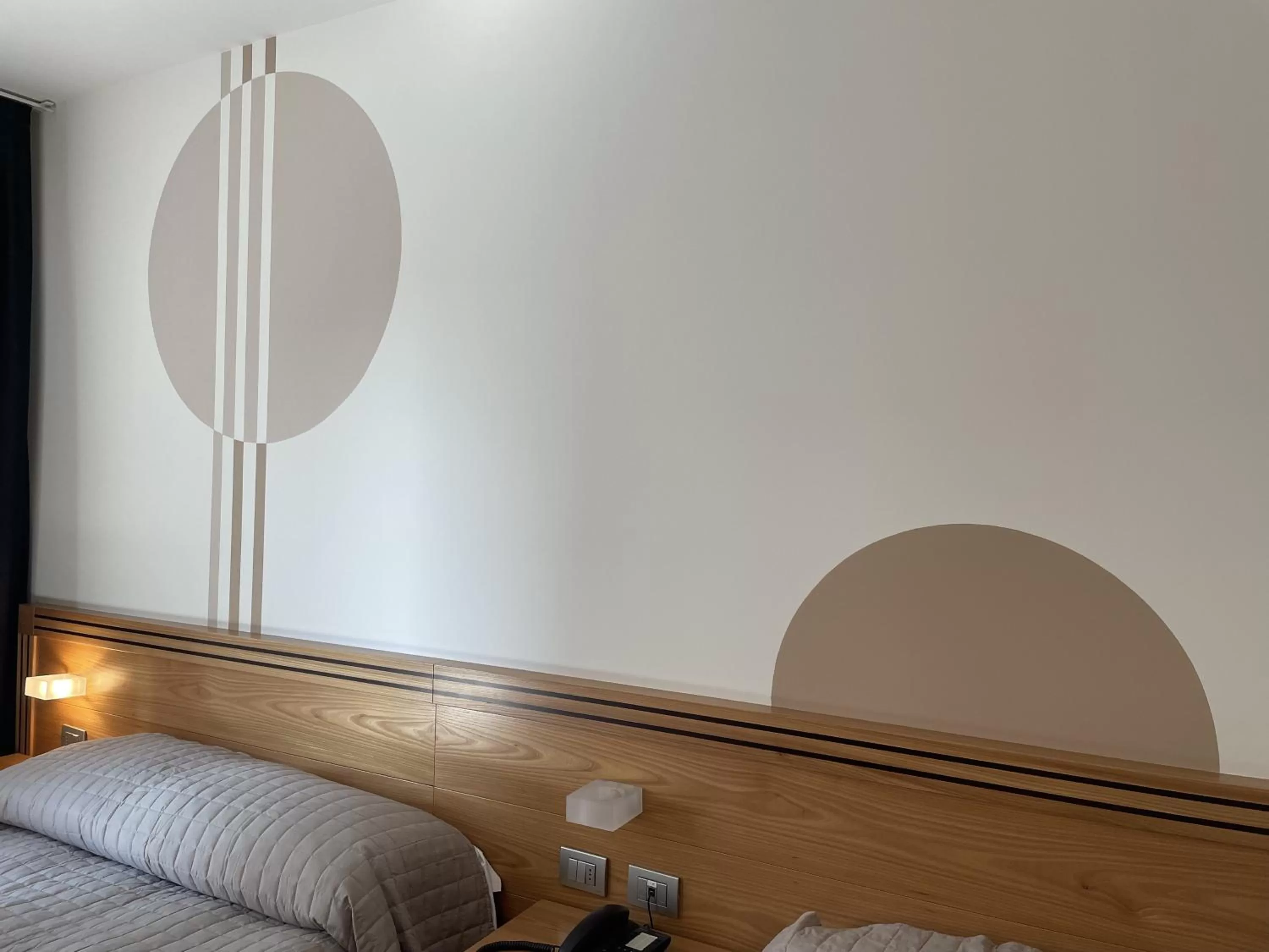 Decorative detail, Bed in Hotel Europa Belluno