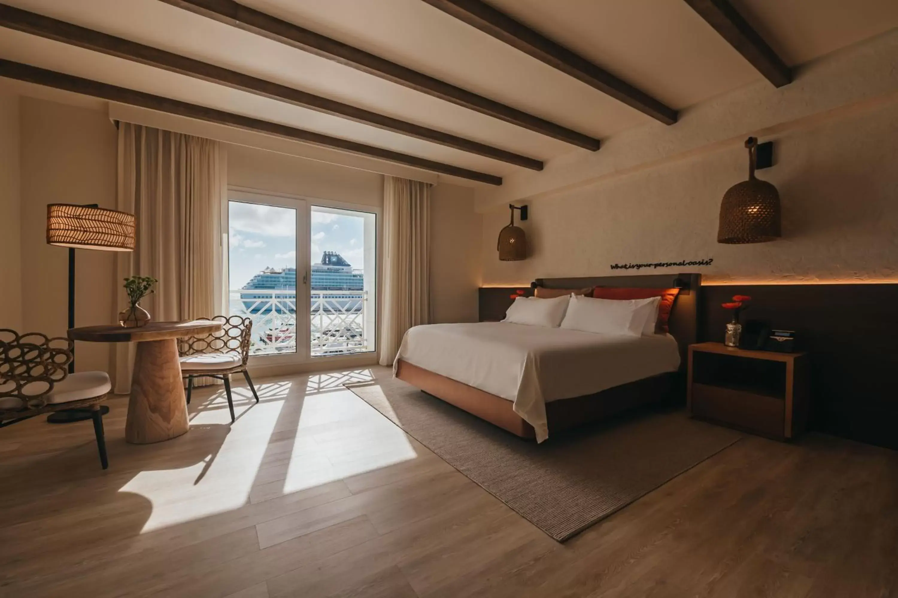 Bedroom, Seating Area in Renaissance Wind Creek Aruba Resort