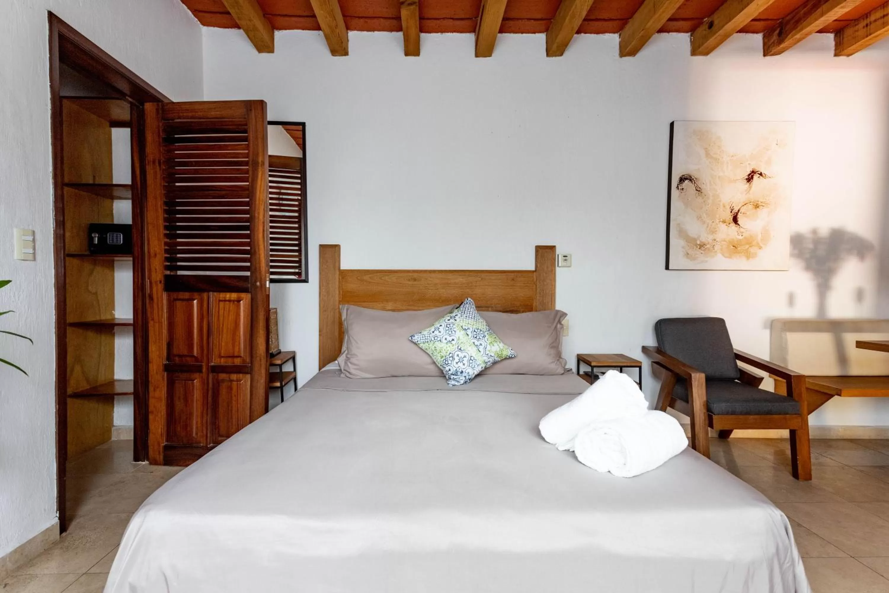 Bed in Olas Altas Suites Departamentos