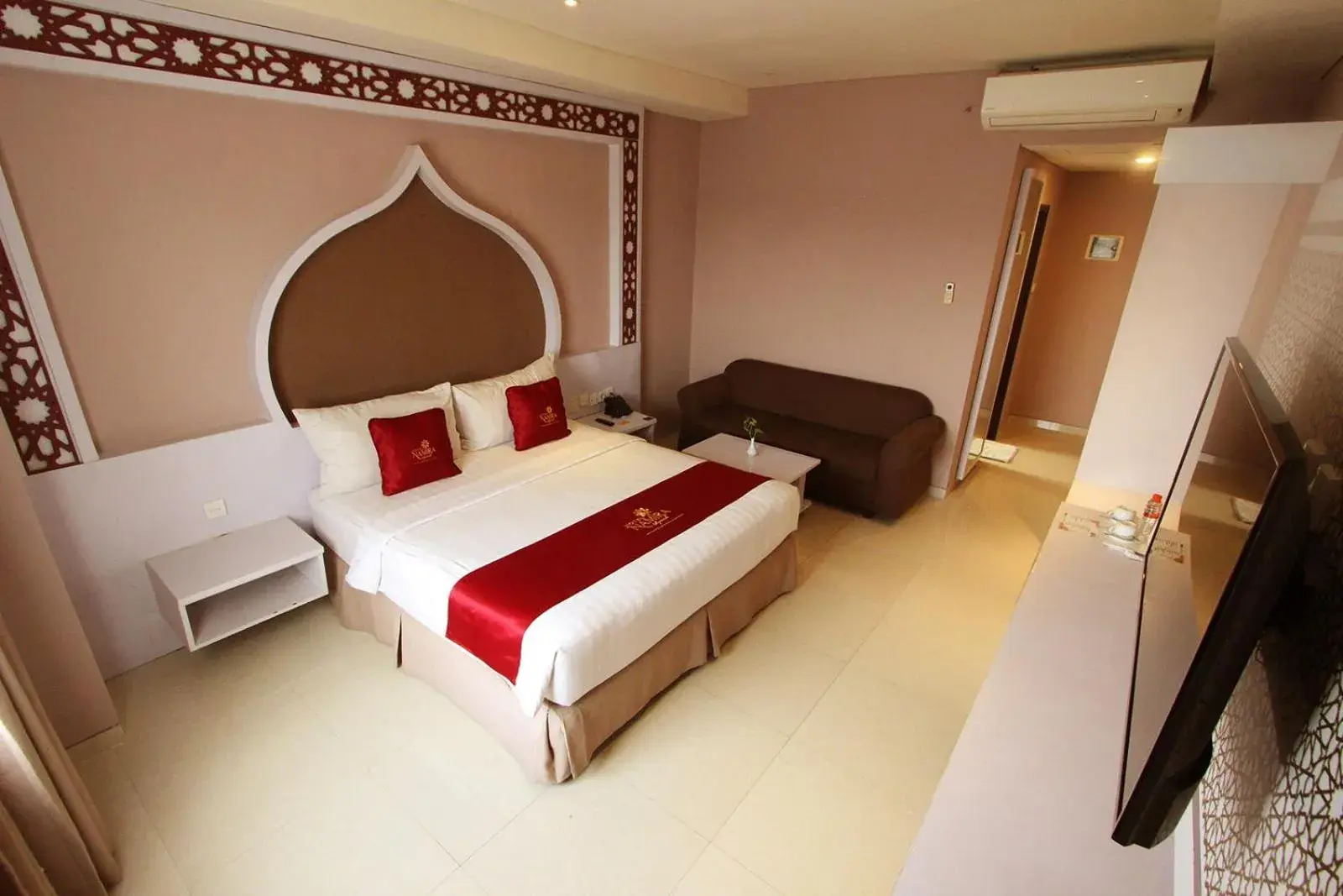 Bed in Namira Syariah Hotel Surabaya