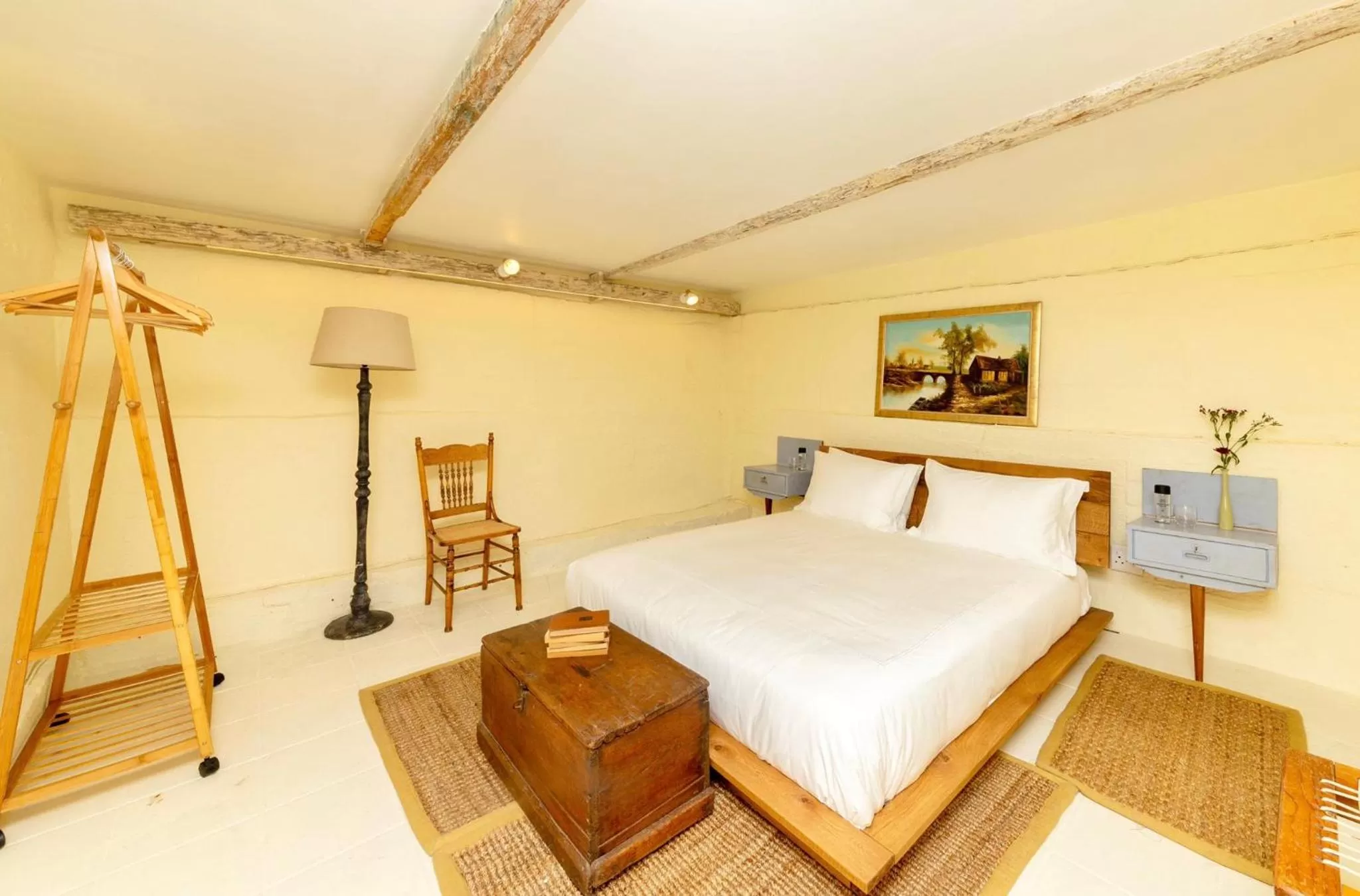 Bed in Amina Boutique Hotel