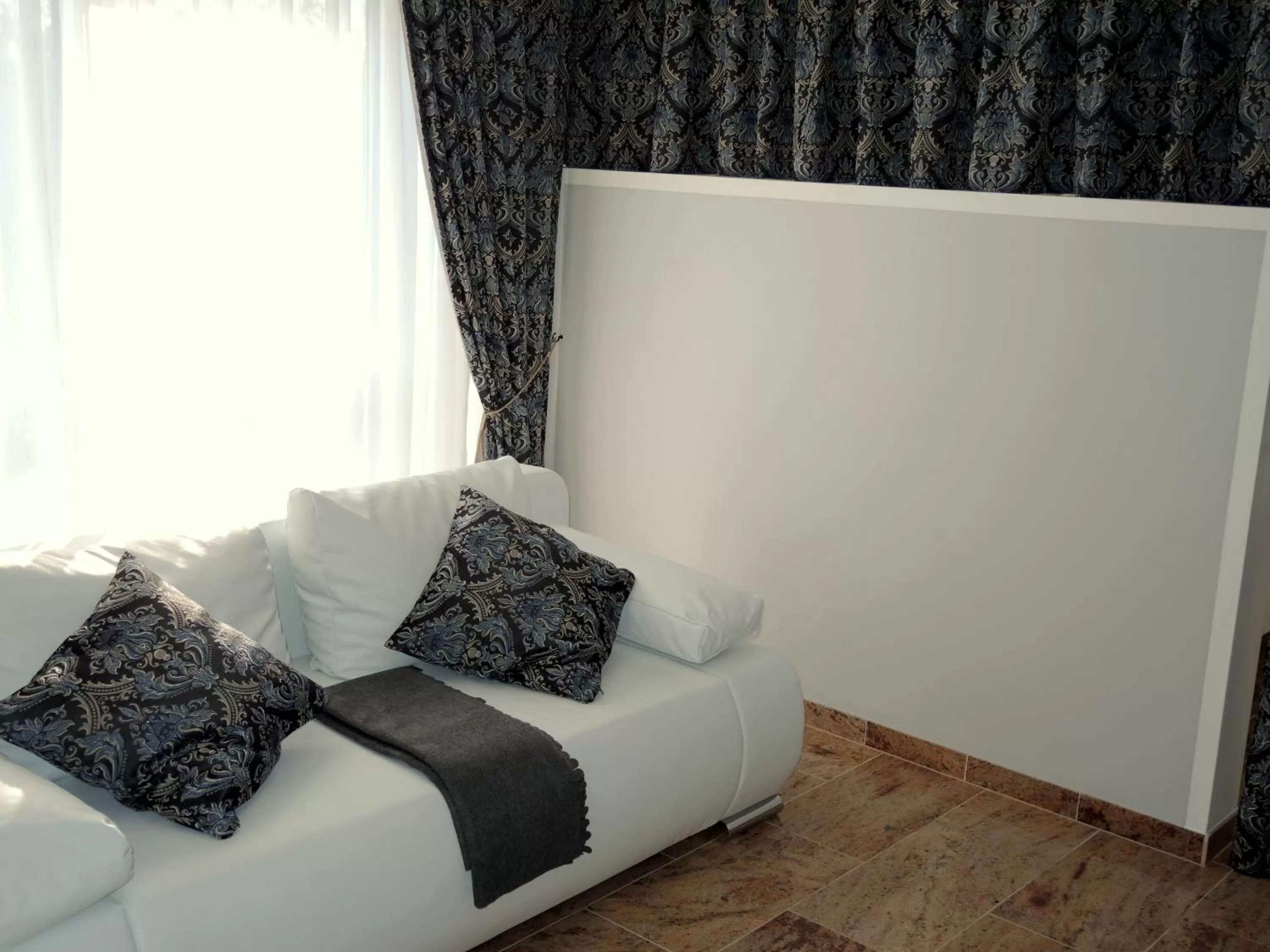 Seating area, Bed in Merkel Villa Apartamente