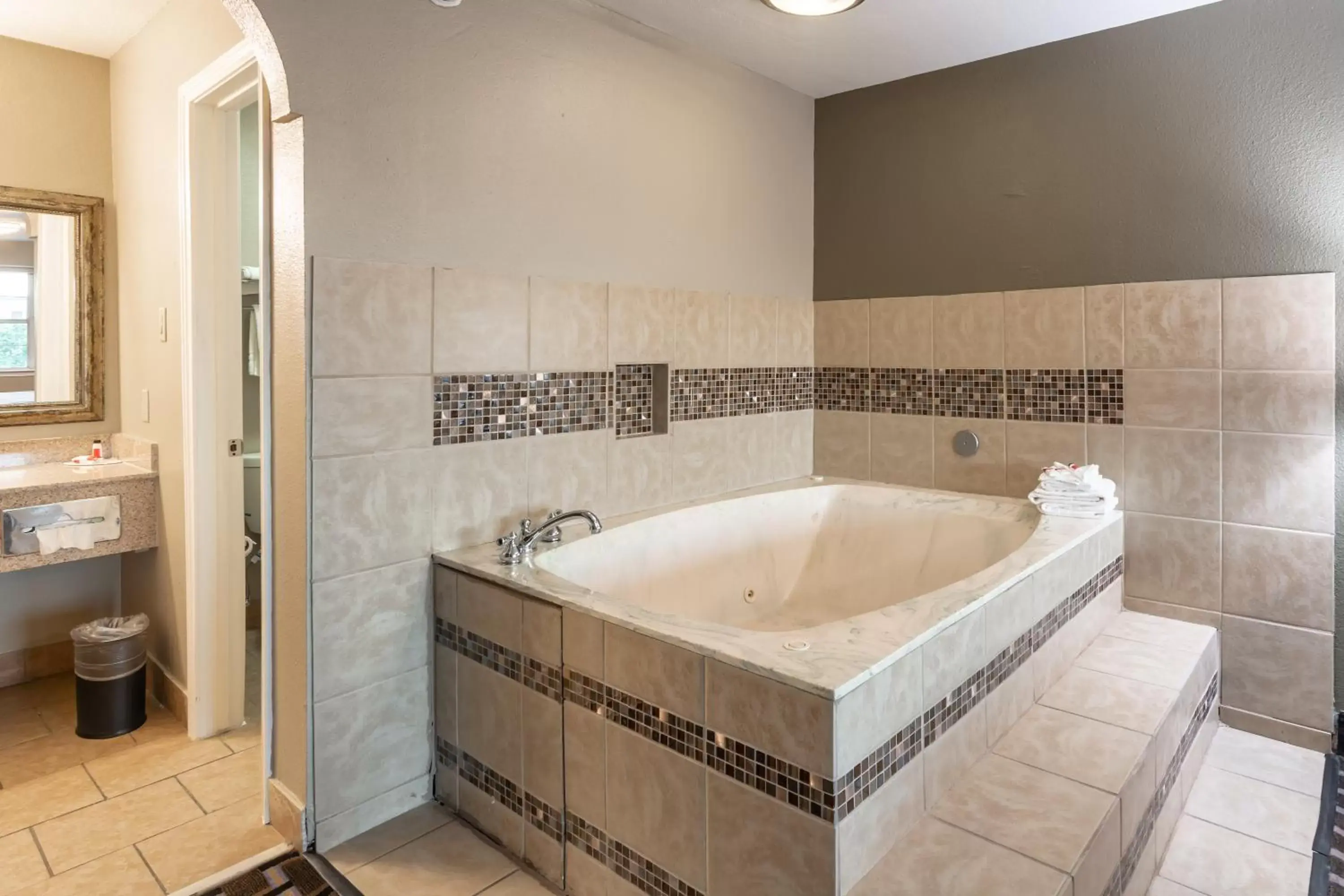 Bathroom in Super 8 by Wyndham Dallas East