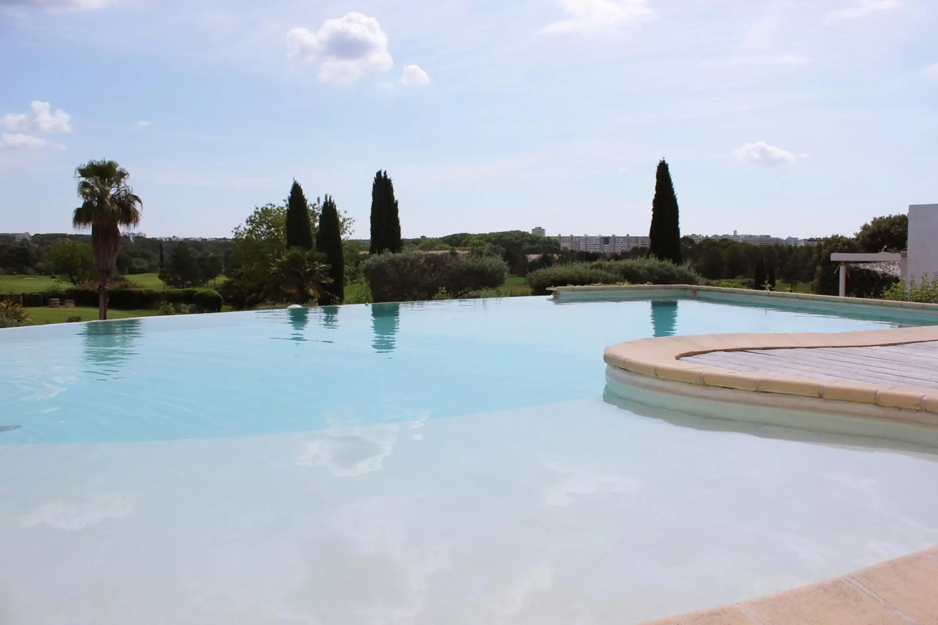 View (from property/room), Swimming Pool in Hôtel Golf Fontcaude