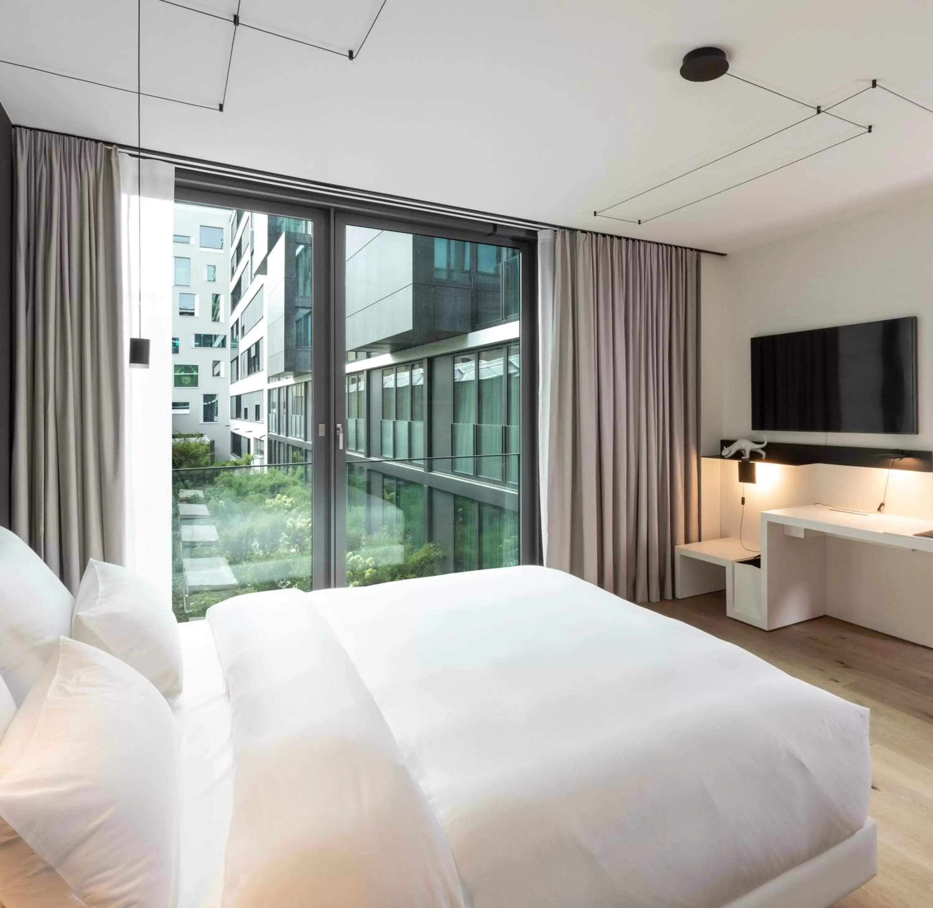 Bed in KPM Hotel & Residences