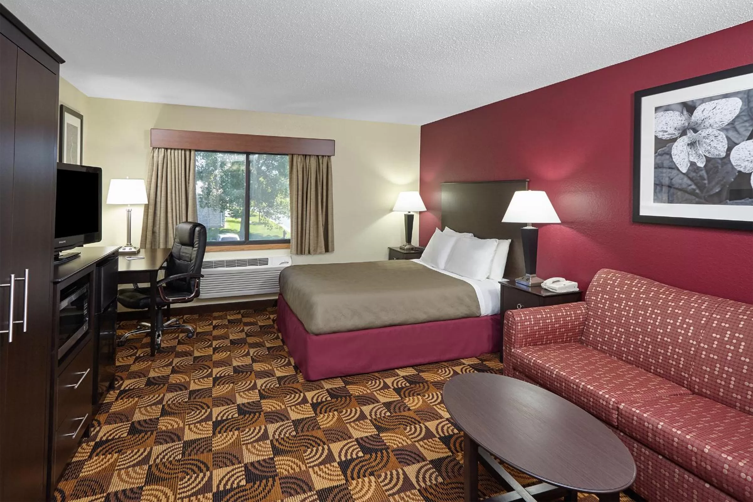 Photo of the whole room, Bed in AmericInn by Wyndham Elkhorn Near Lake Geneva