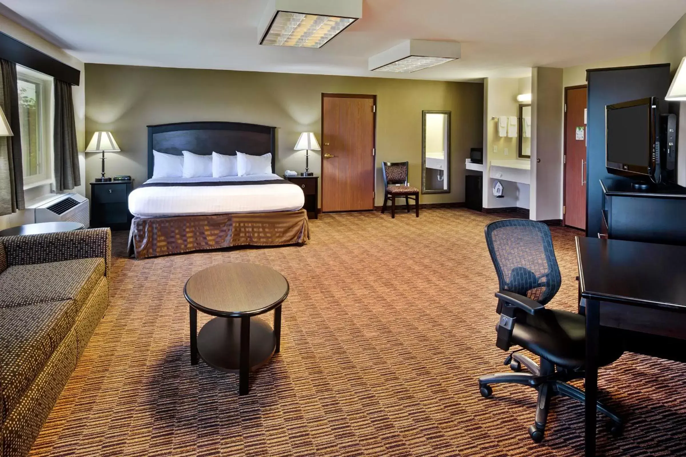 Photo of the whole room in AmericInn by Wyndham Beaver Dam