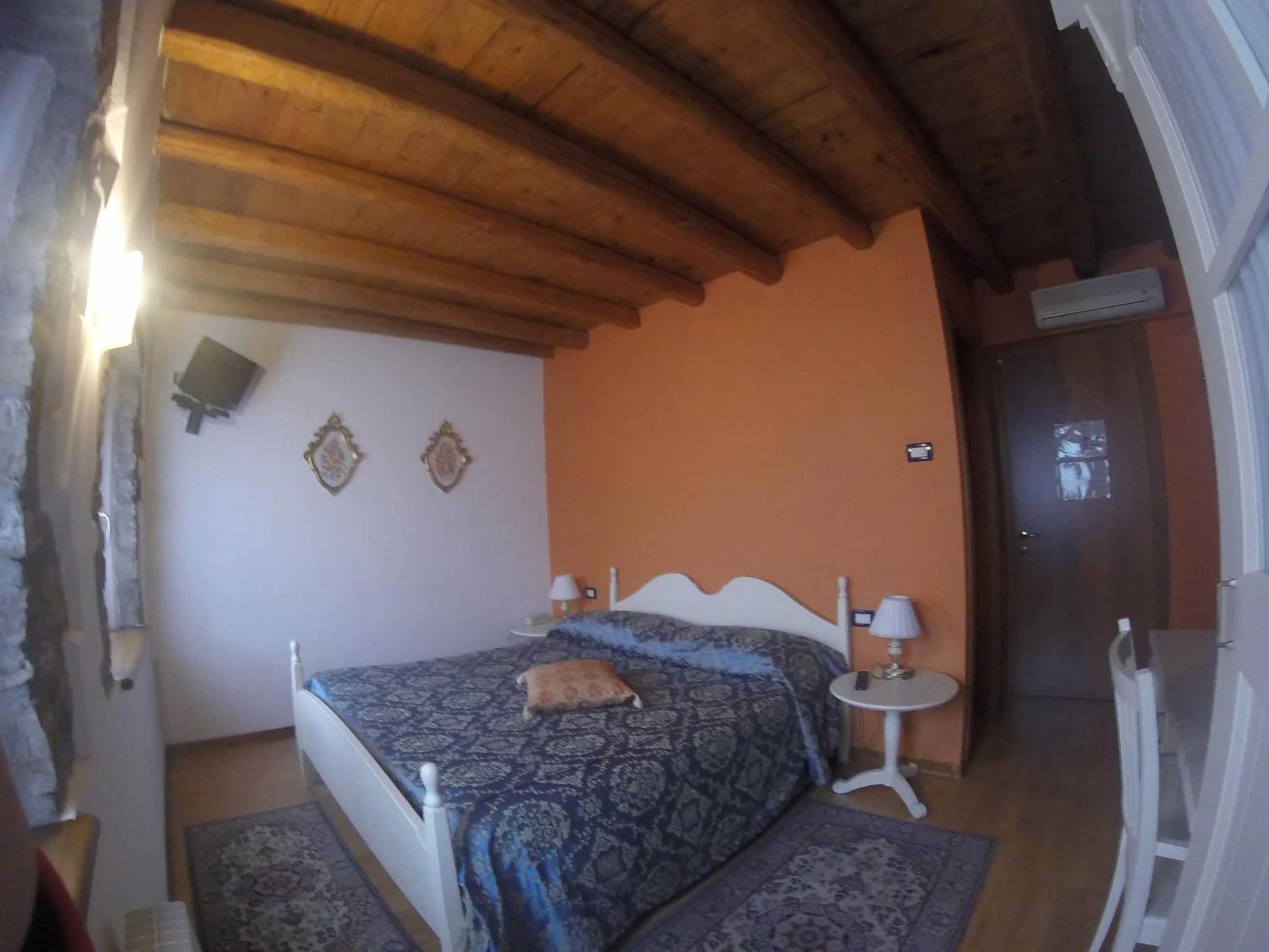 Bed in Hotel Calvi-Ristorante Mainor