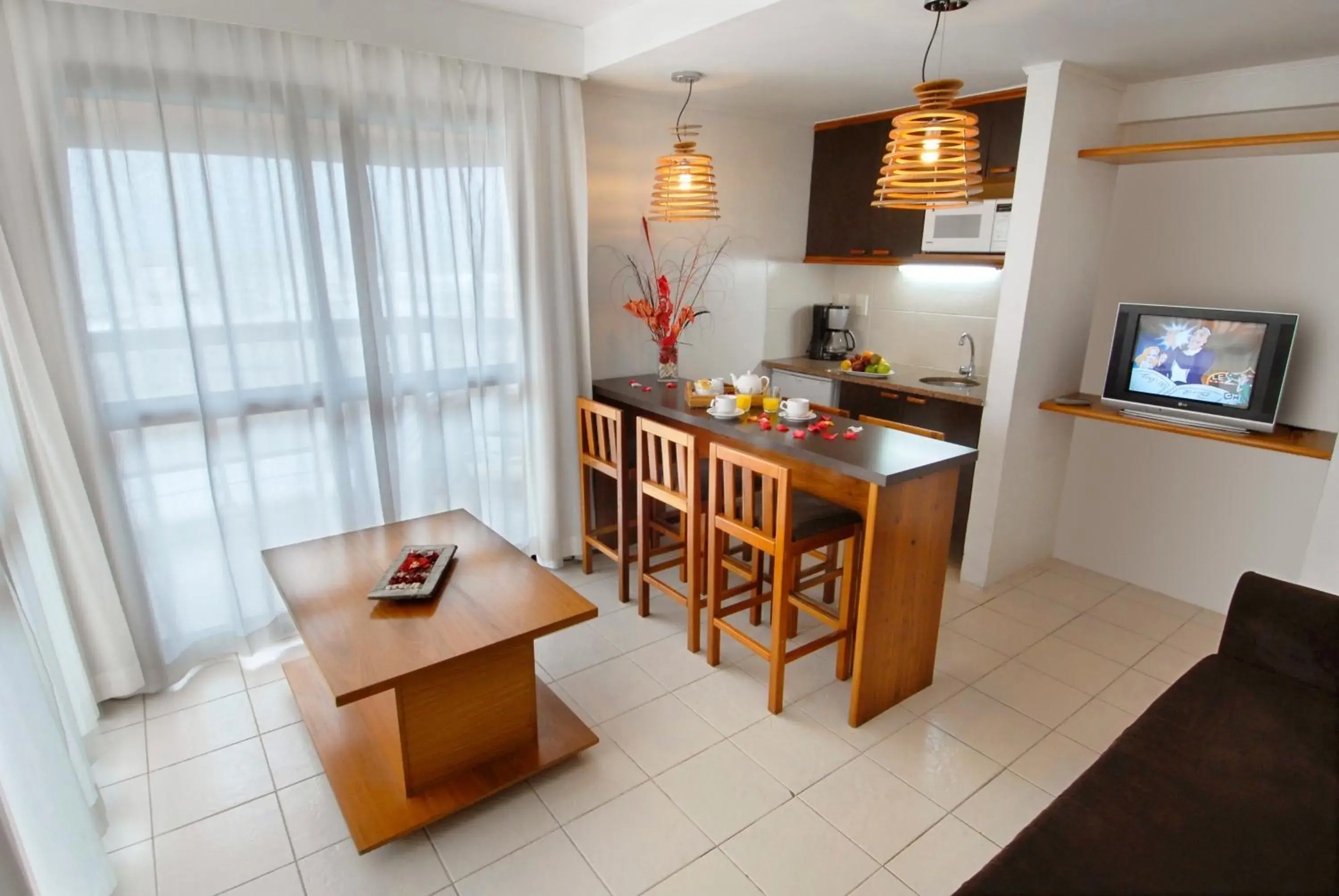 Kitchen or kitchenette, Dining Area in Golden Beach Resort & Spa