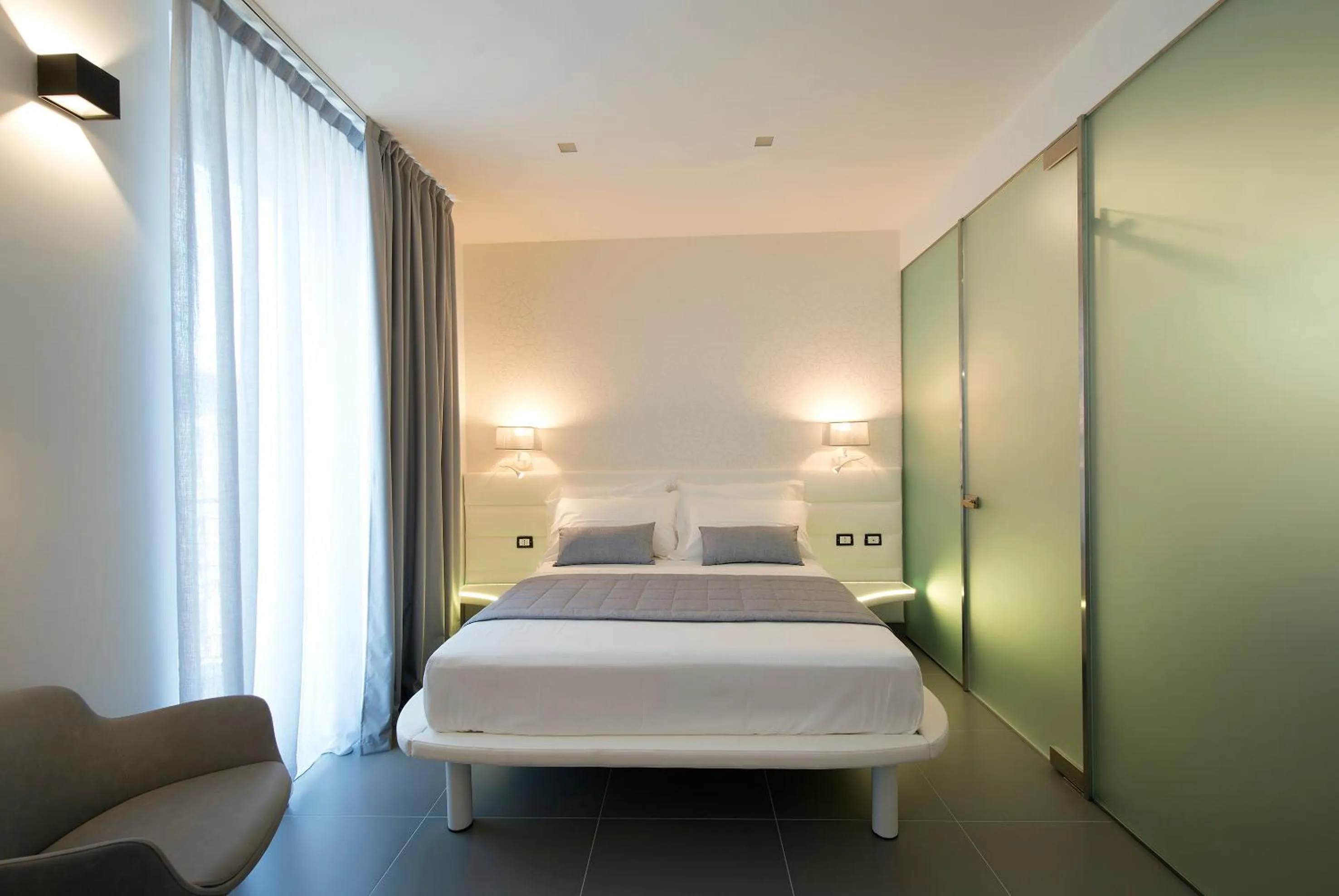 Bed in Gatto Bianco Mia Aparthotel