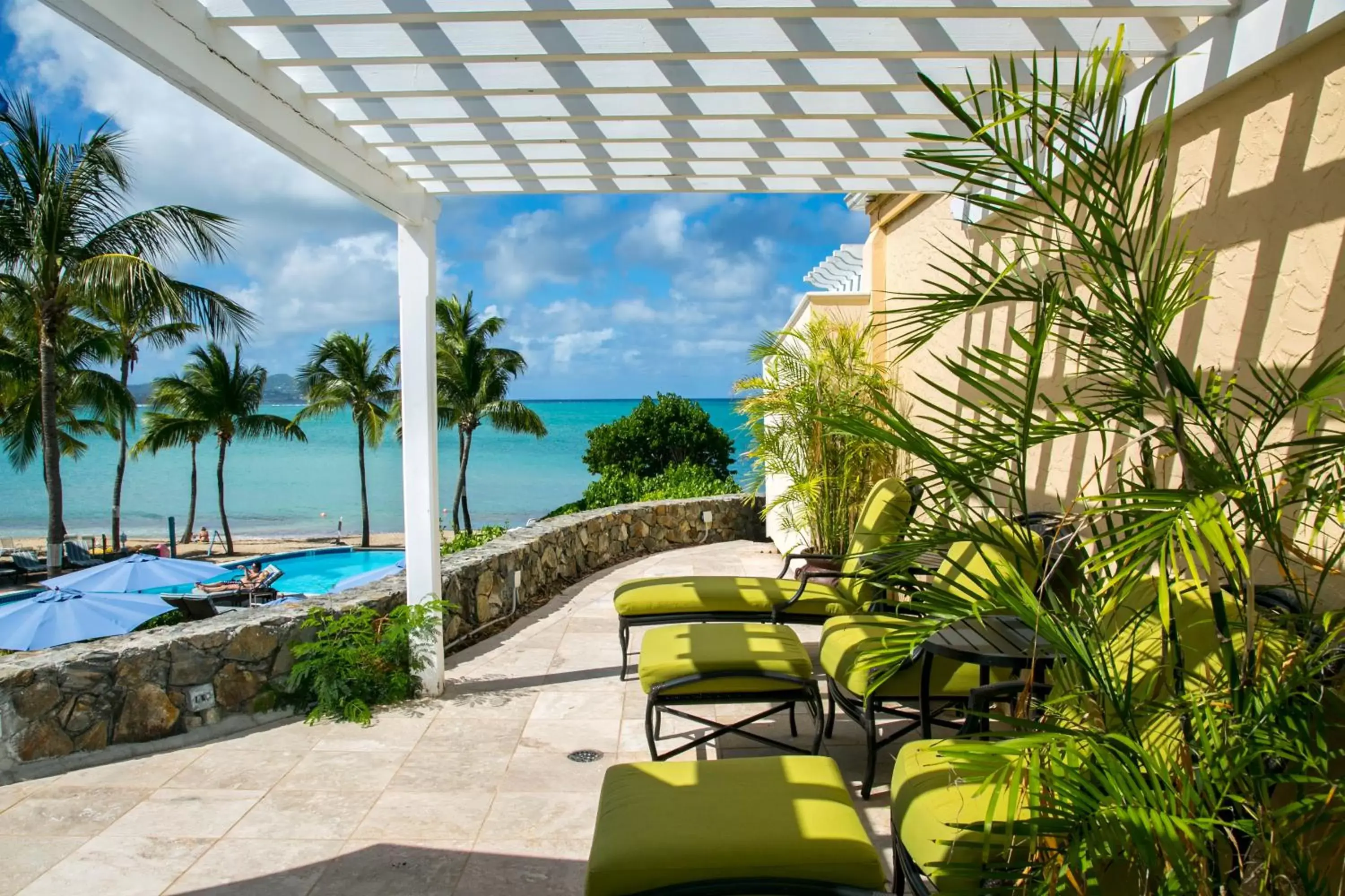 Balcony/Terrace, Swimming Pool in The Buccaneer Beach & Golf Resort