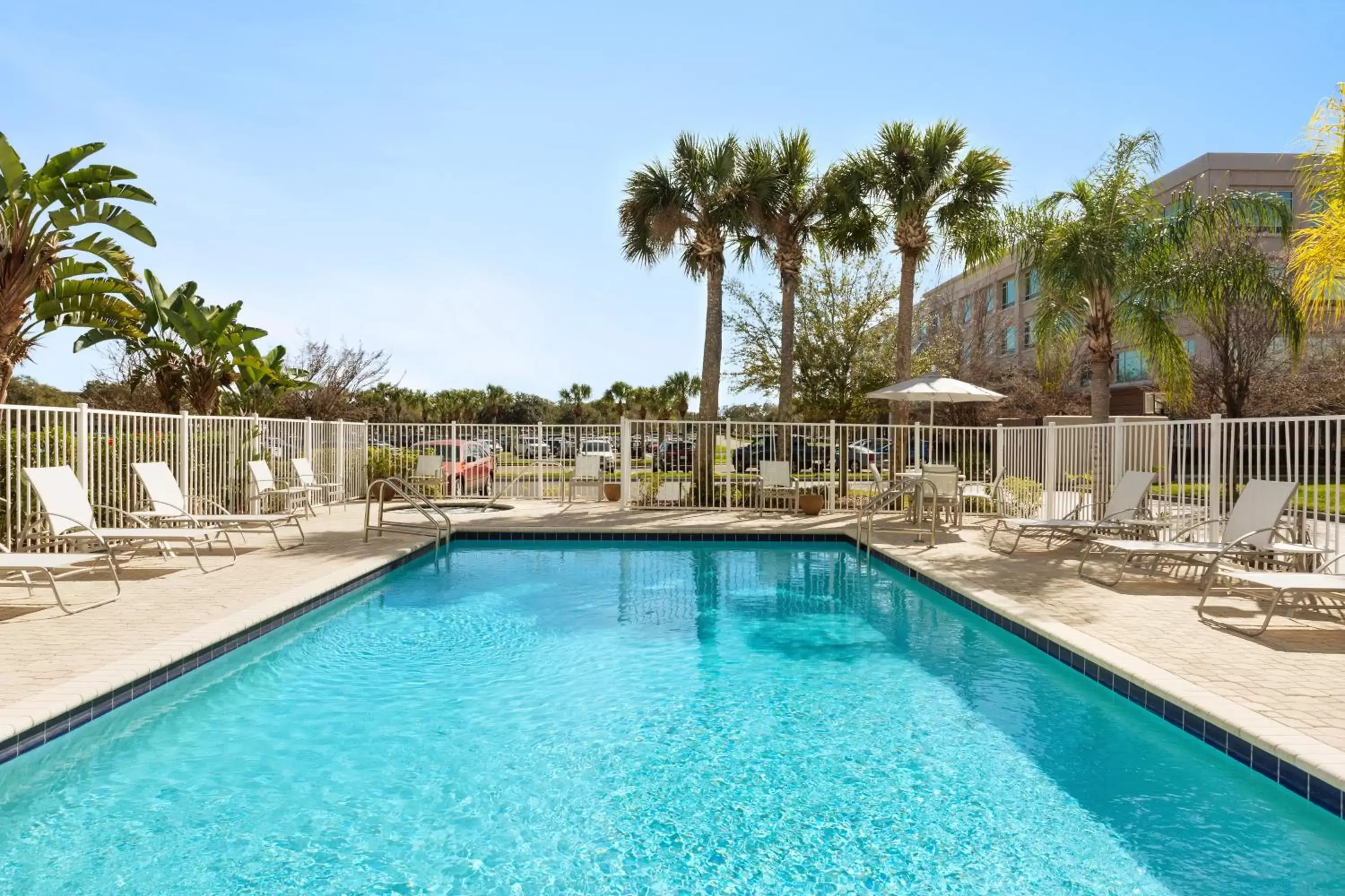Swimming pool in Staybridge Suites Tampa East- Brandon by IHG Swimming pool in Staybridge Suites Tampa East- Brandon by IHG